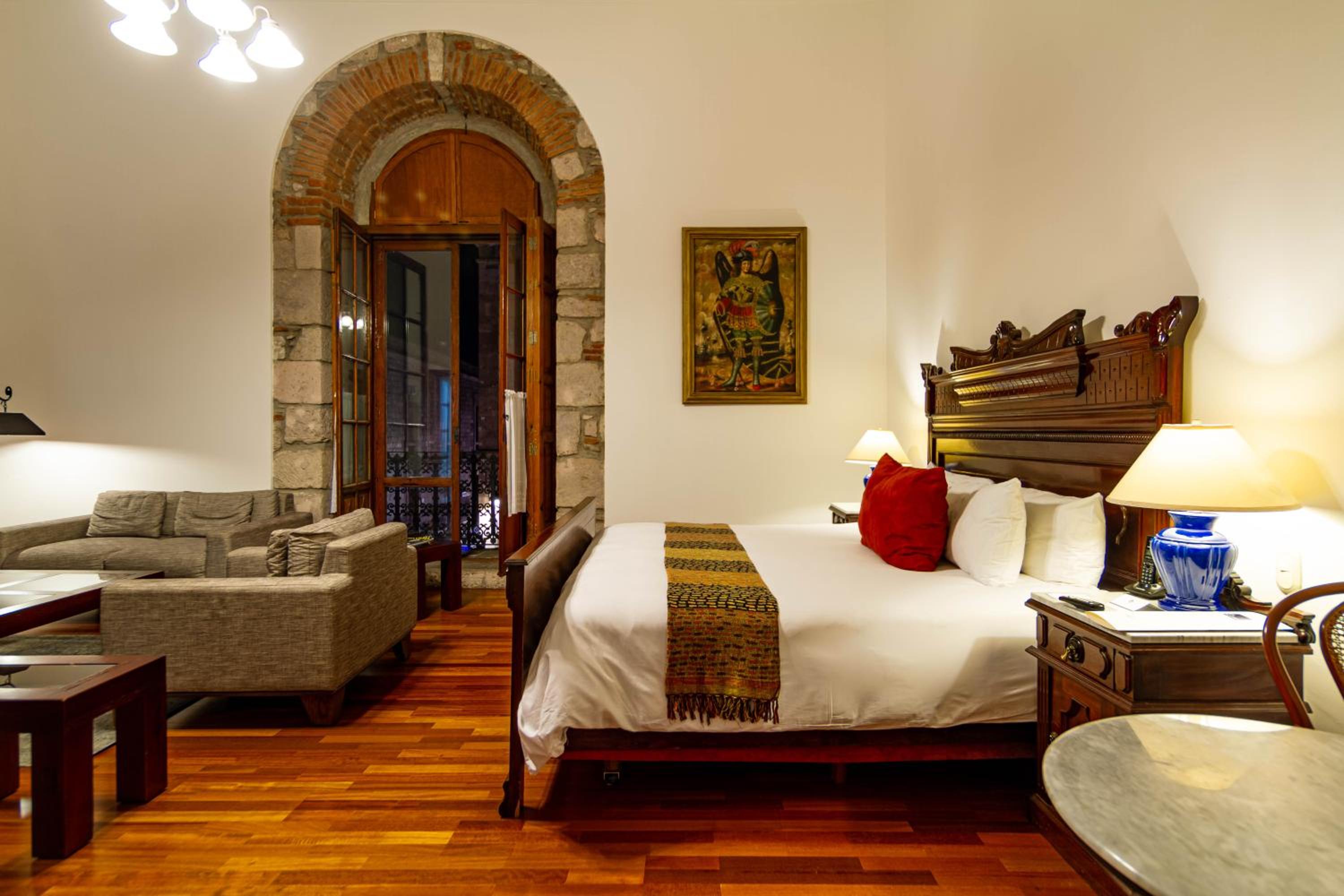 King Suite with Balcony - Photo 1
