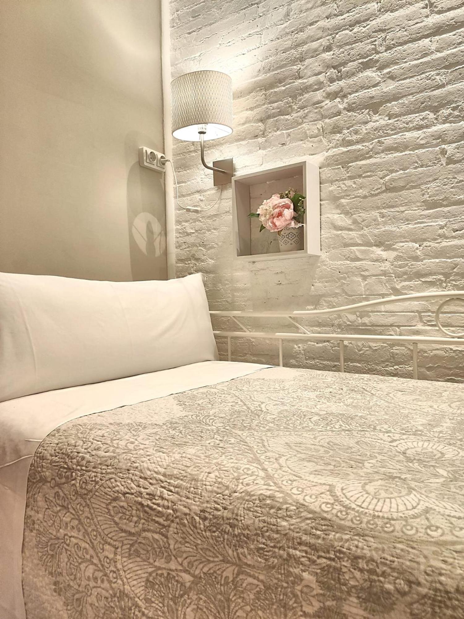 Habitación individual con baño compartido
