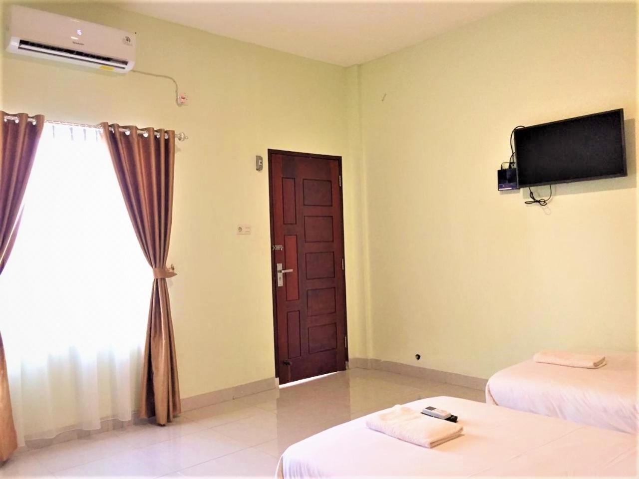 Standard Twin Room - Photo 5