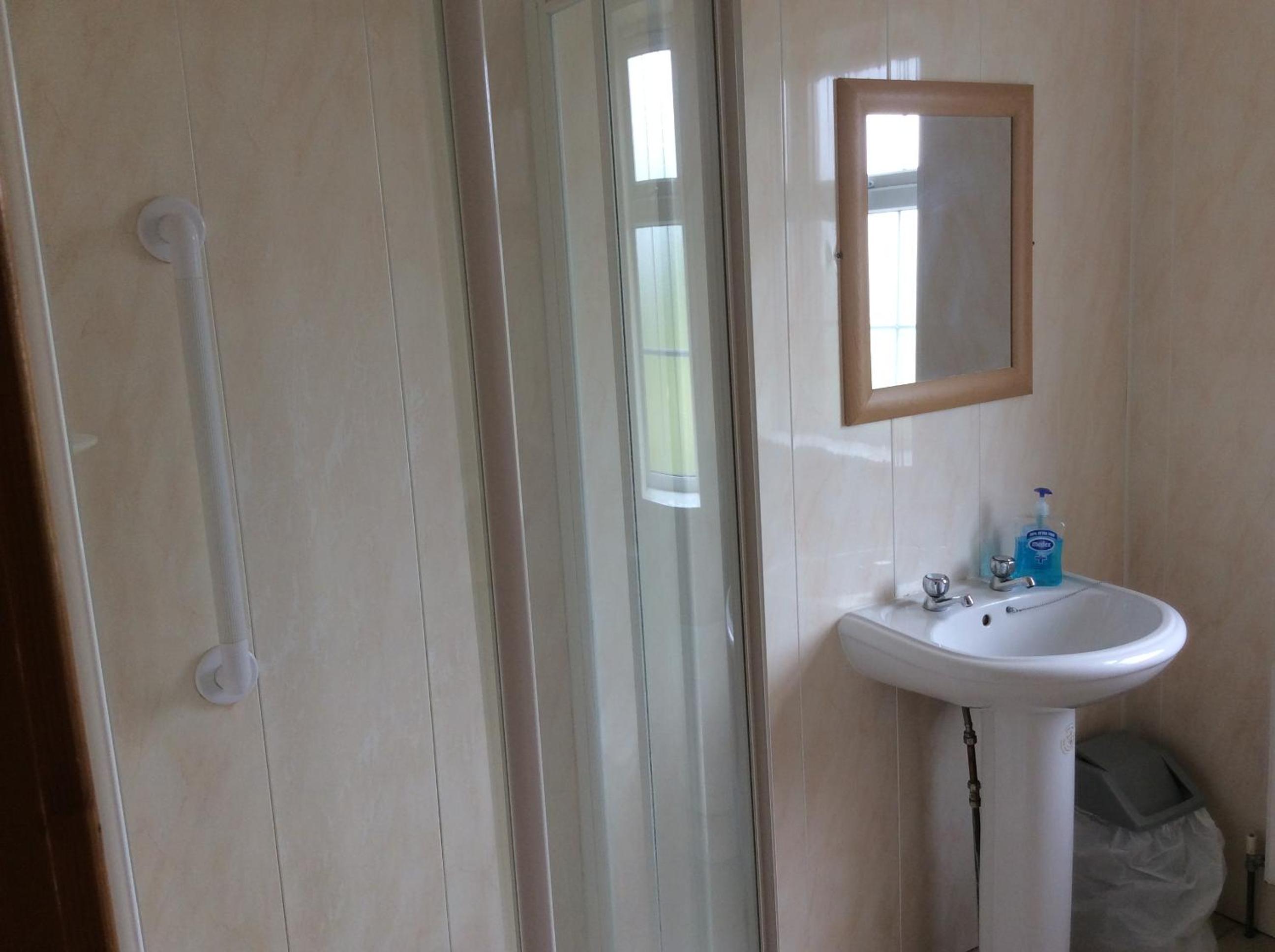 Three-Bedroom House - Photo 36