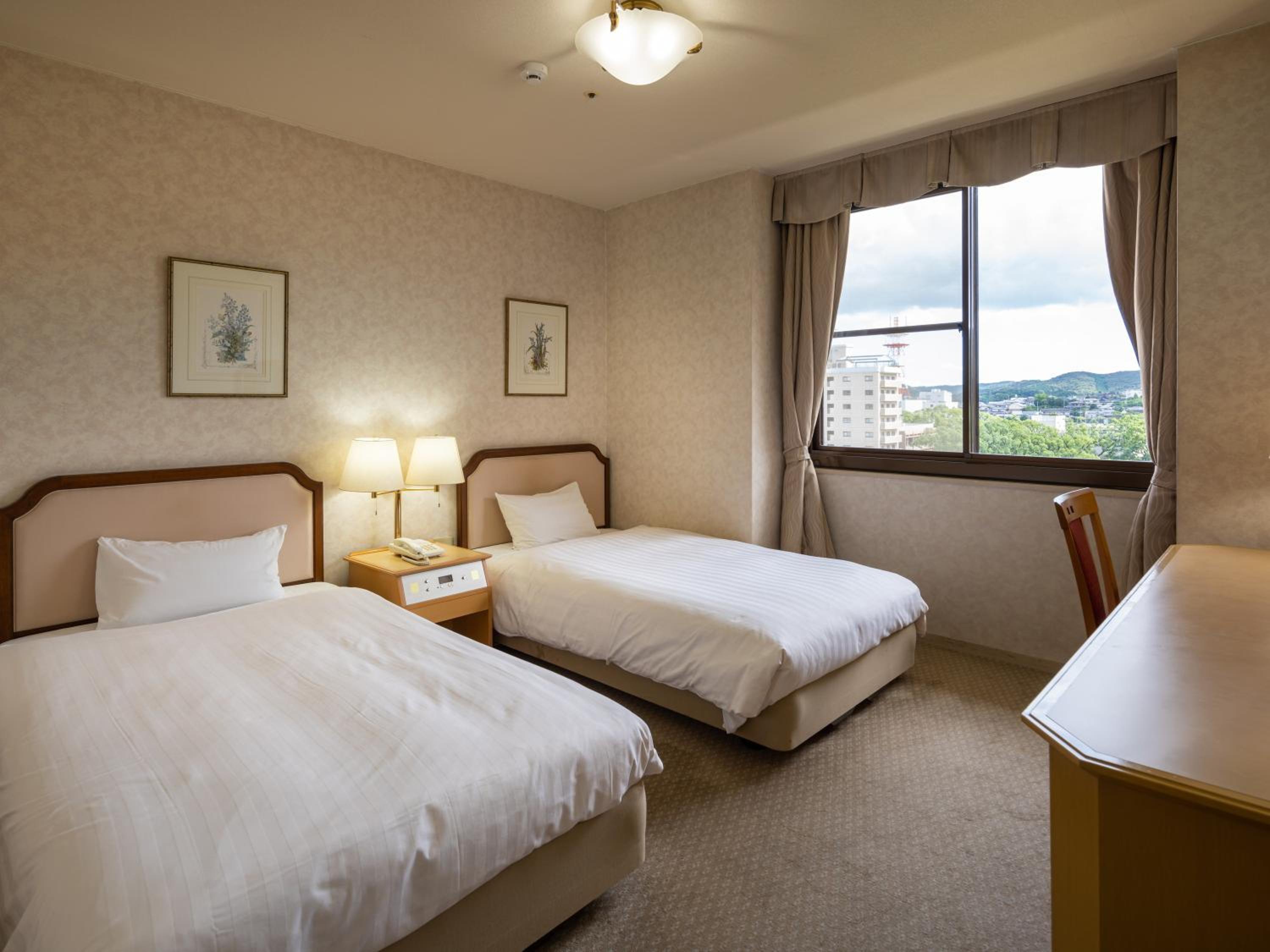 Standard Twin Room - Photo 1