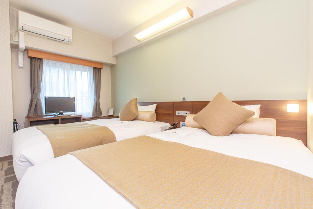 Twin Room - Non-Smoking - Photo 1