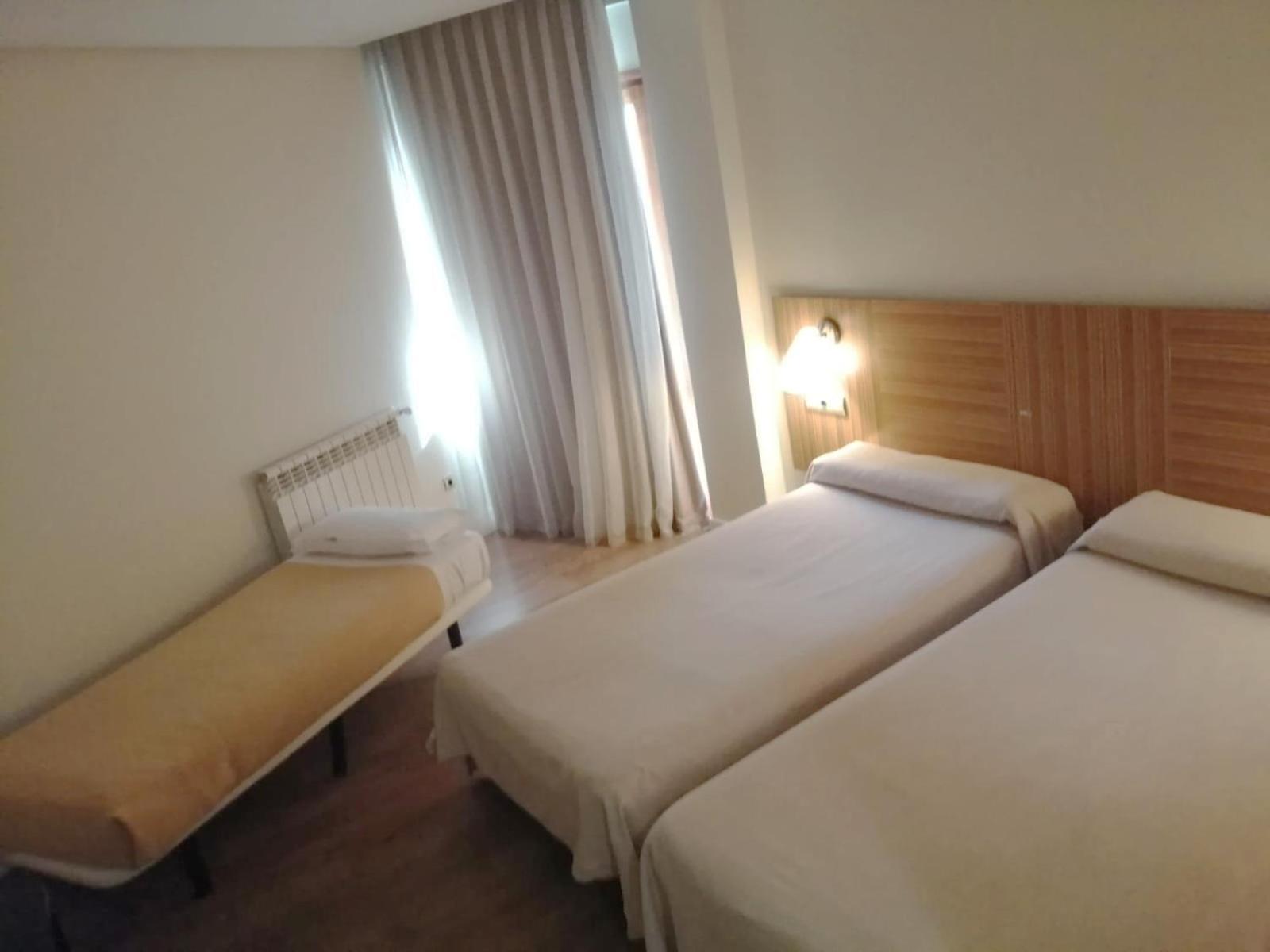 Economy Triple Room (2 Adults + 1 Child) photo 2