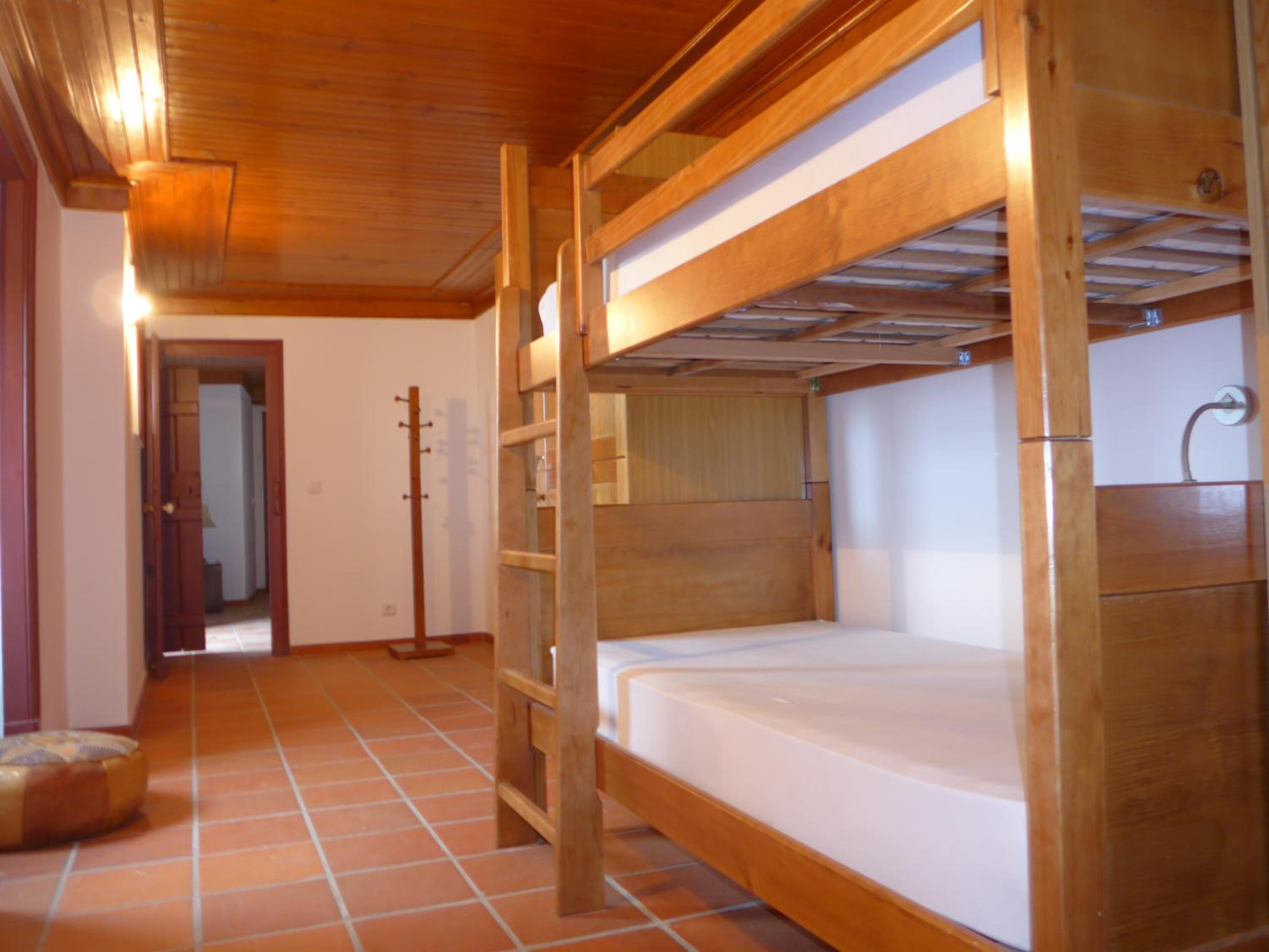 Single Bed in Dormitory Room