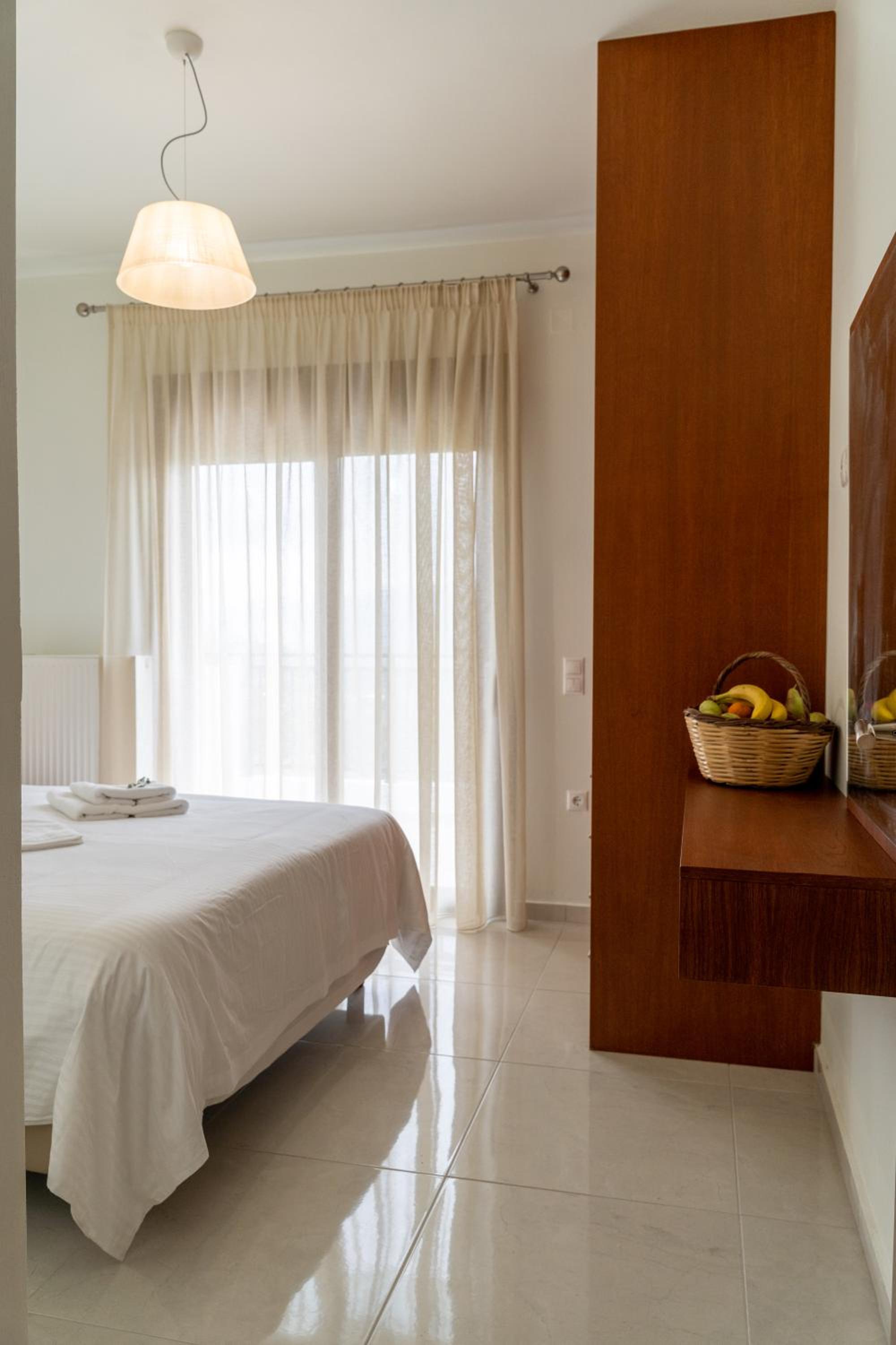 Deluxe Quadruple Room - Photo 5