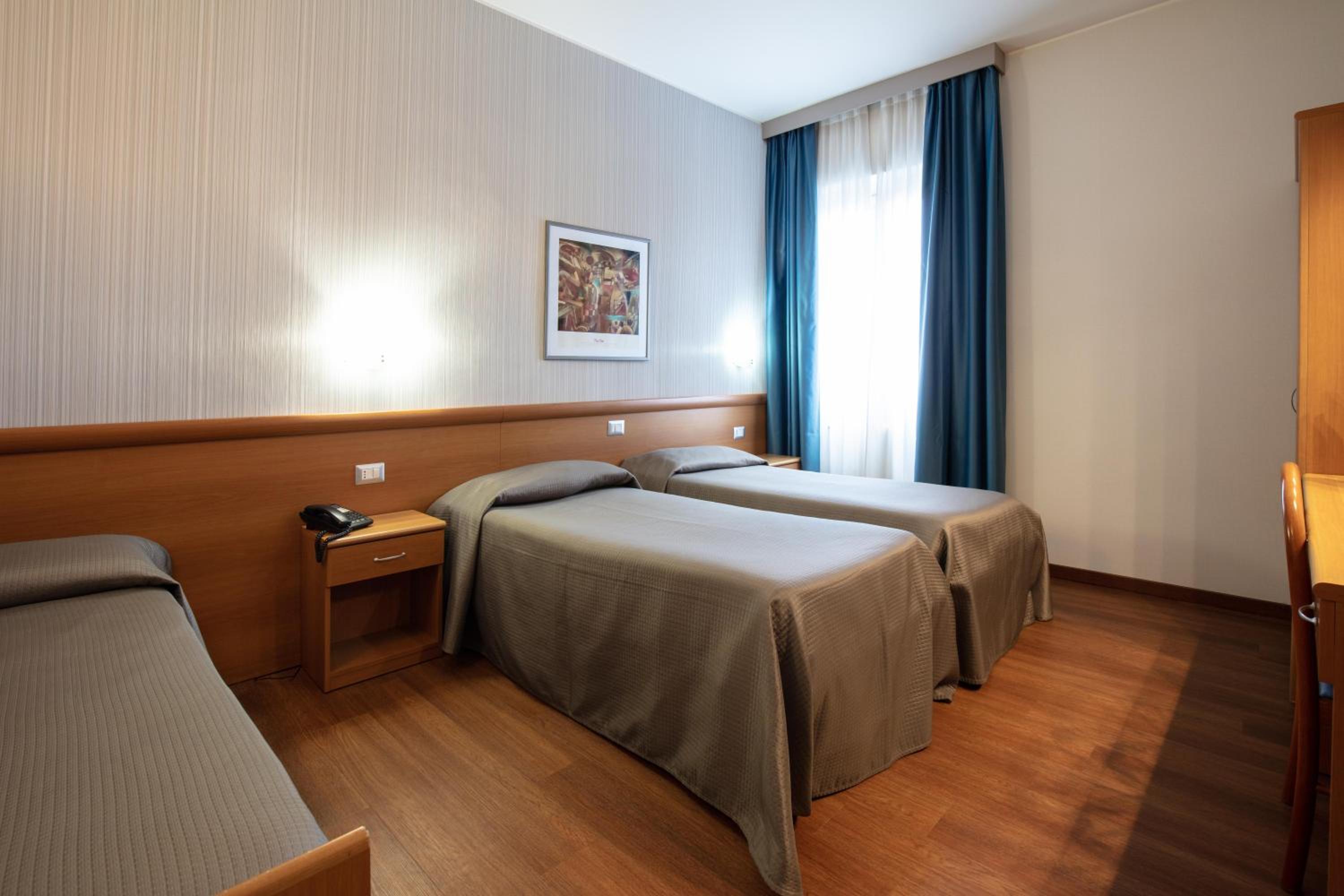 Triple Room - Photo 1