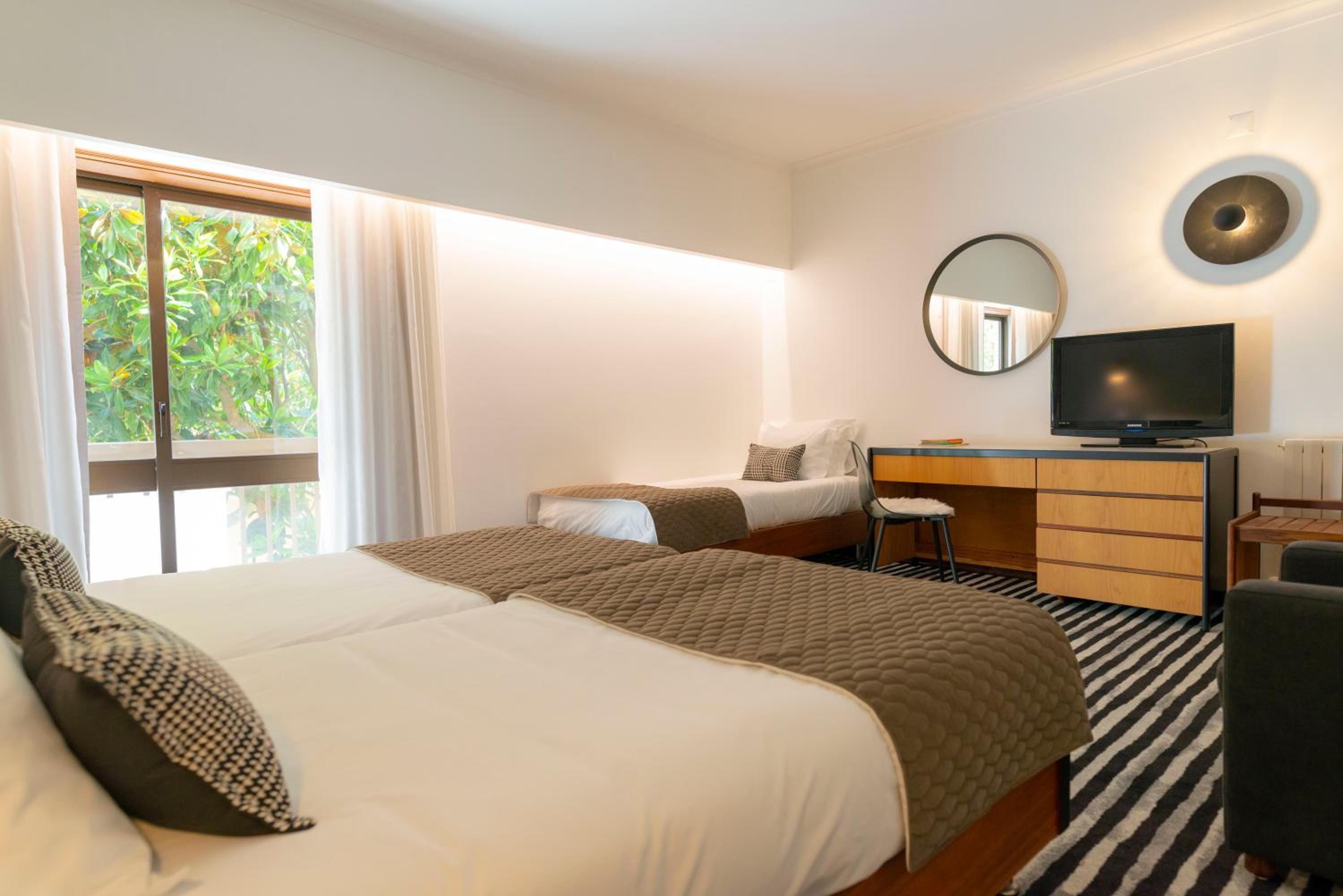 Quadruple Room (3 Adults + 1 Child)