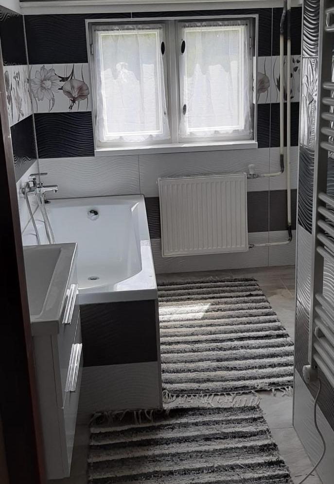 Three-Bedroom House - Photo 23