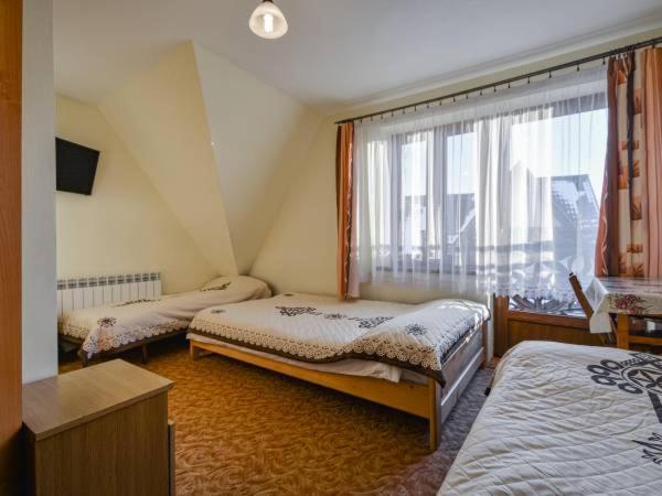 Quadruple Room - Photo 1