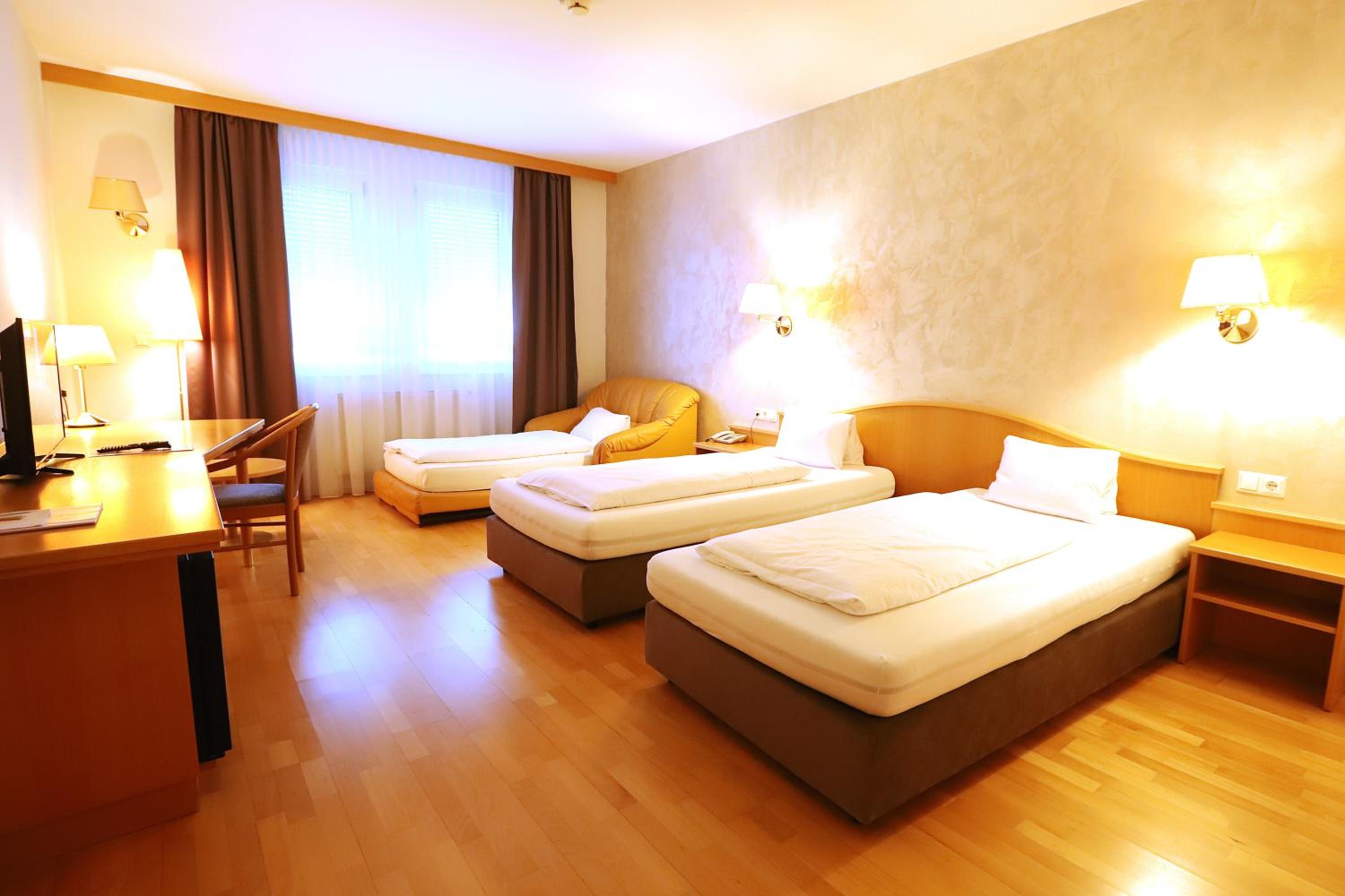 Triple Room - Photo 1