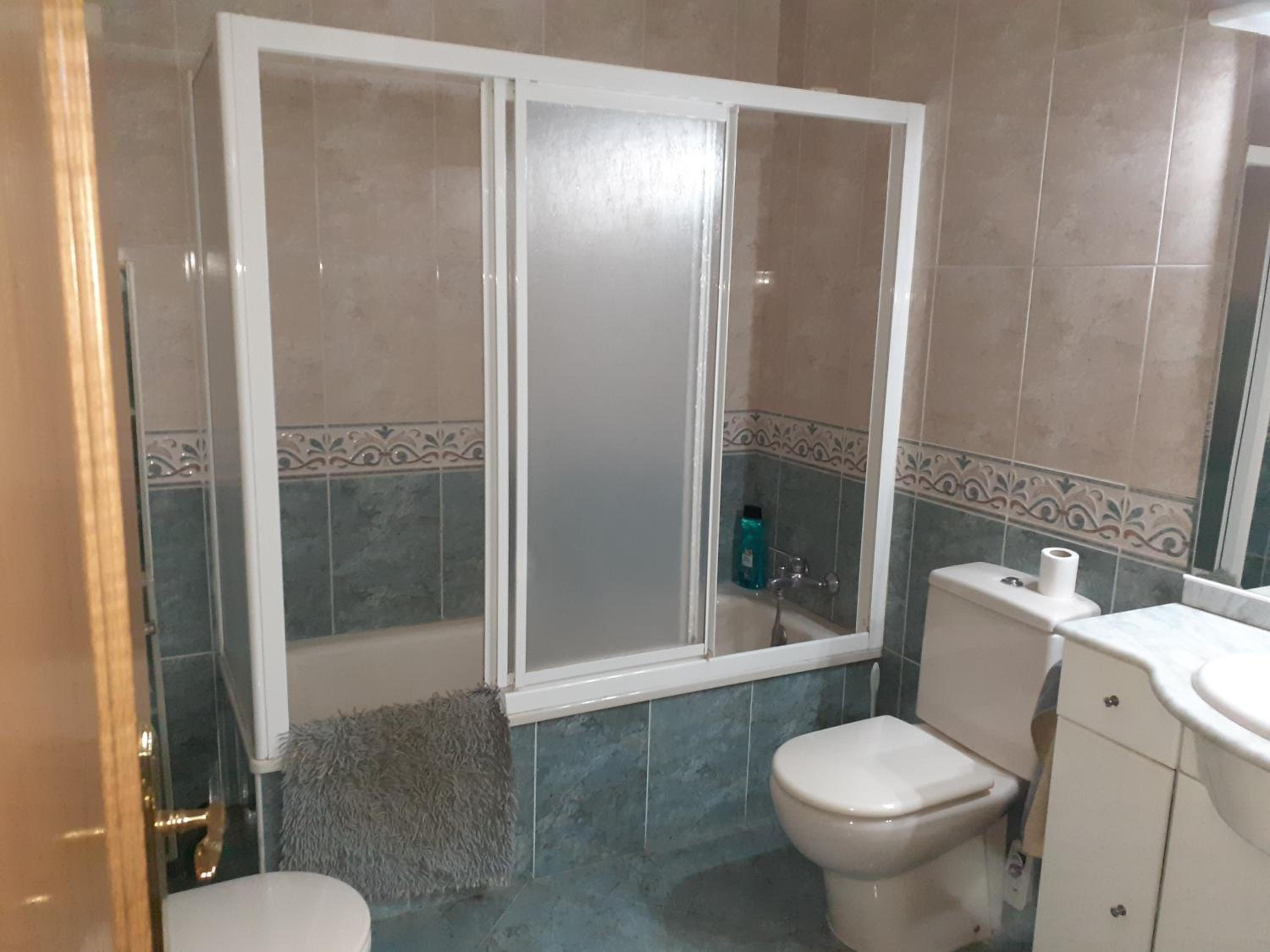 Three-Bedroom House - Photo 2