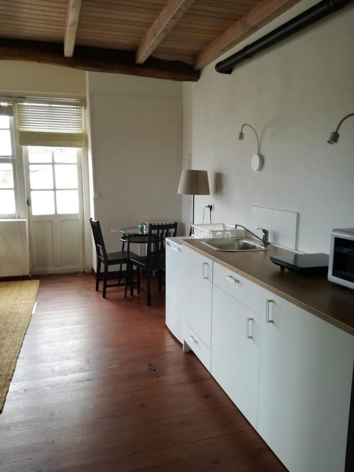 Apartment with Balcony - Photo 6