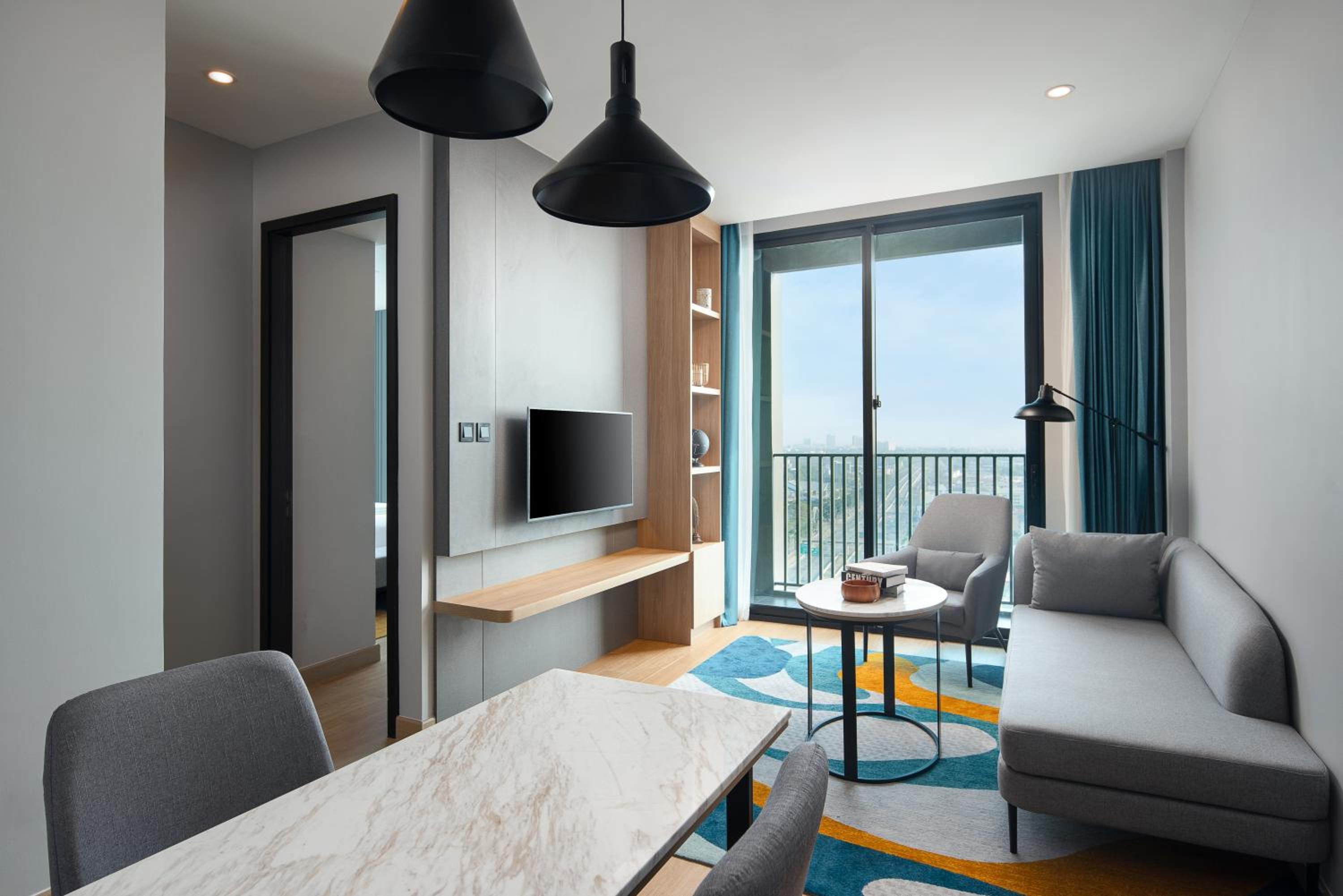 Two-Bedroom Suite with One King Bed, Two Single Beds and Balcony - Photo 1