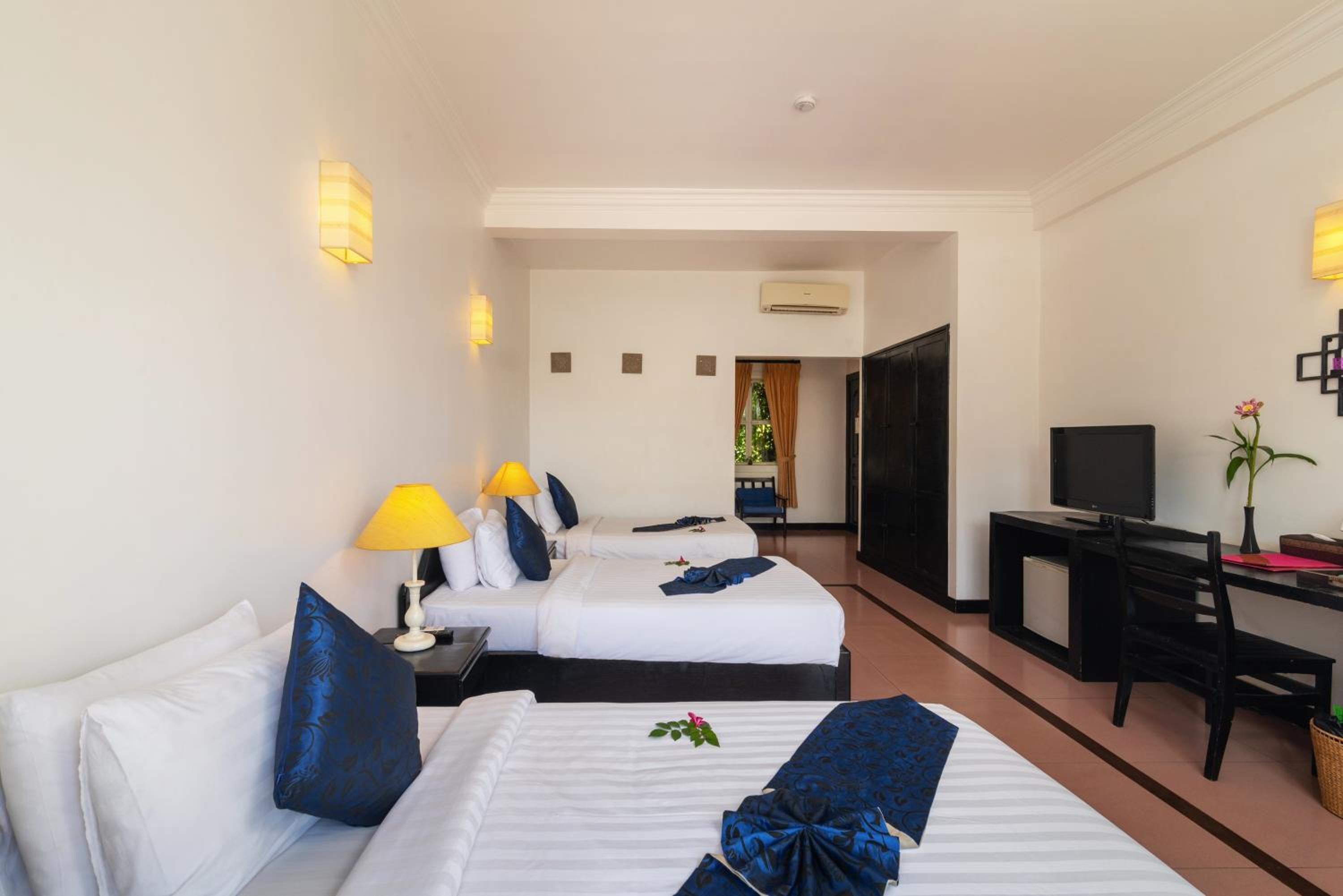 Deluxe Triple Room - Photo 4