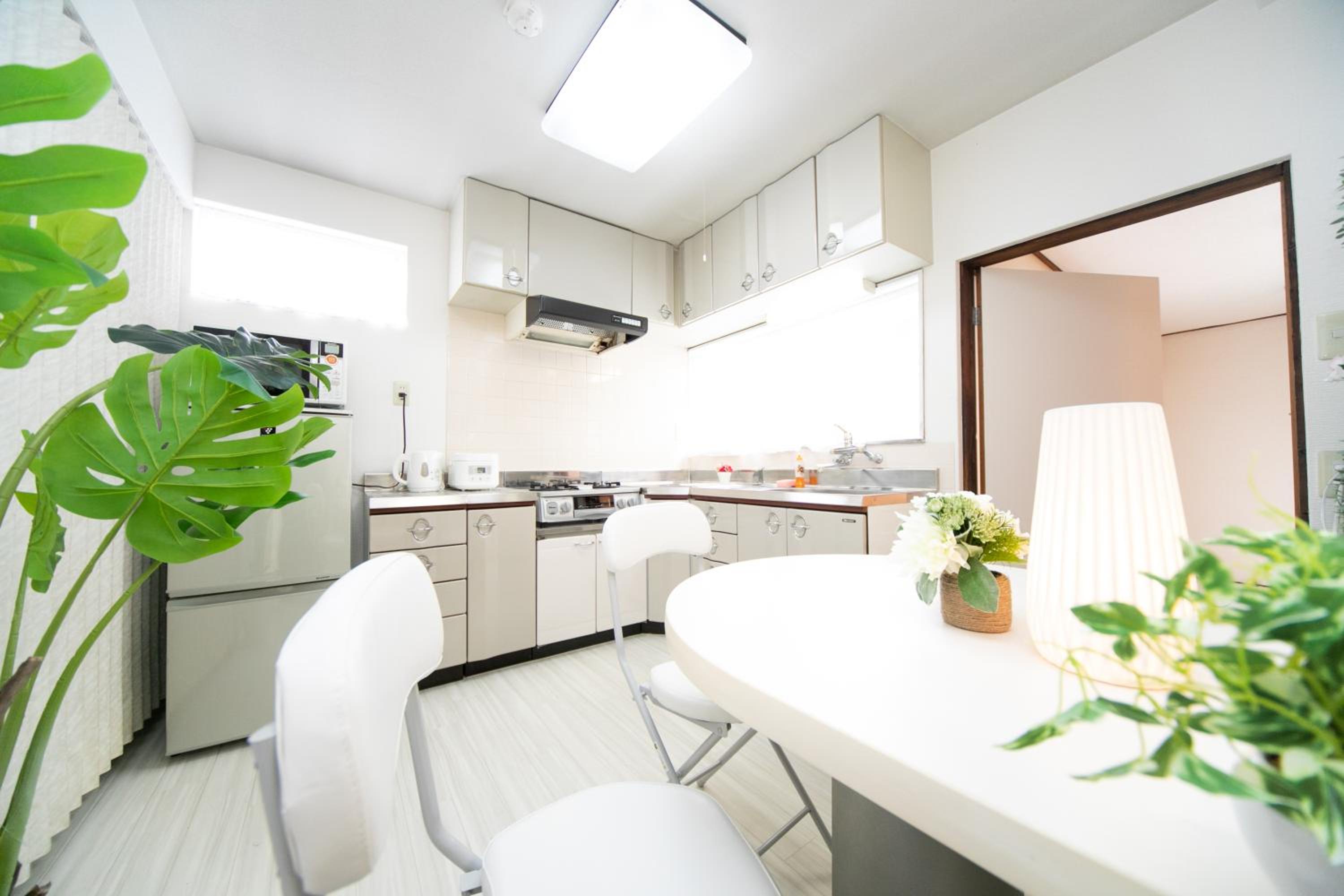 Three-Bedroom House - Photo 32