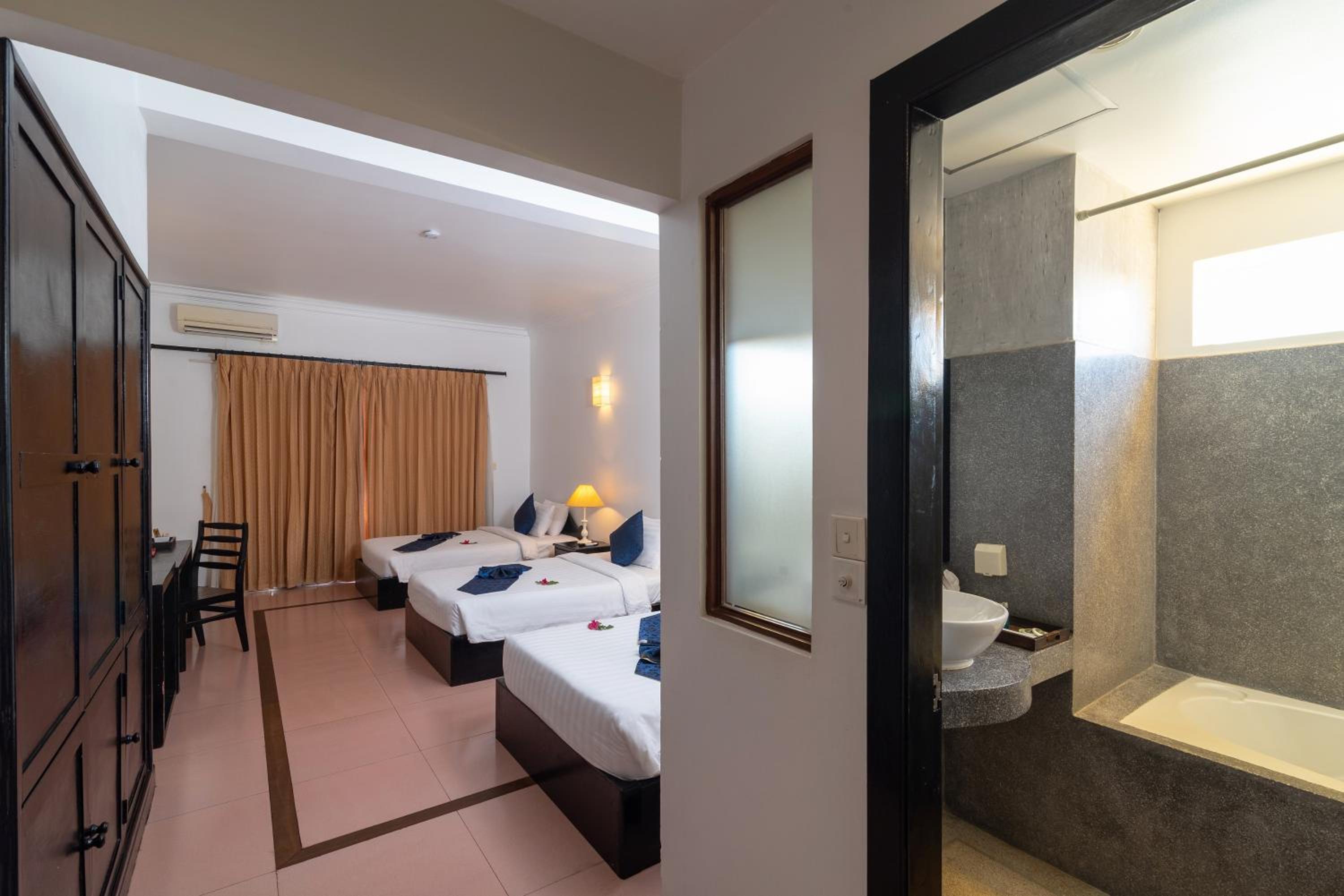 Deluxe Triple Room - Photo 5