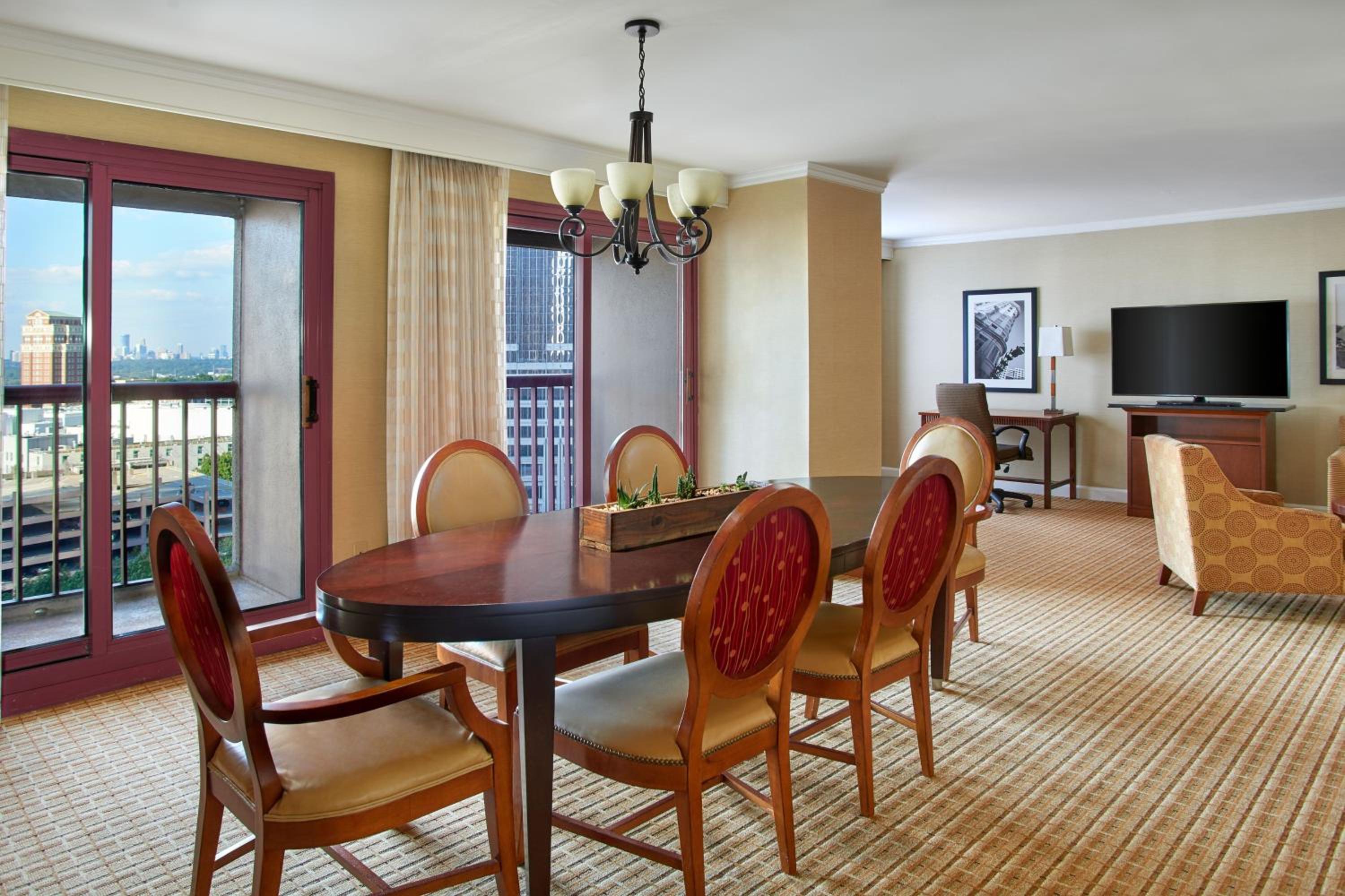 One-Bedroom Hospitality King Suite with Sofa Bed and City View