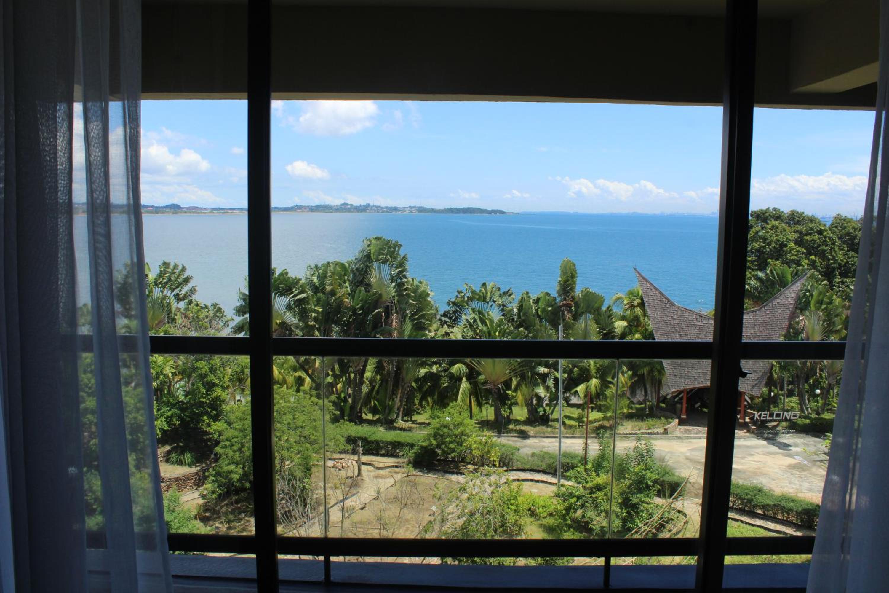Deluxe Double or Twin Room with Free Shuttle from Nongsapura Ferry Terminal - Photo 7