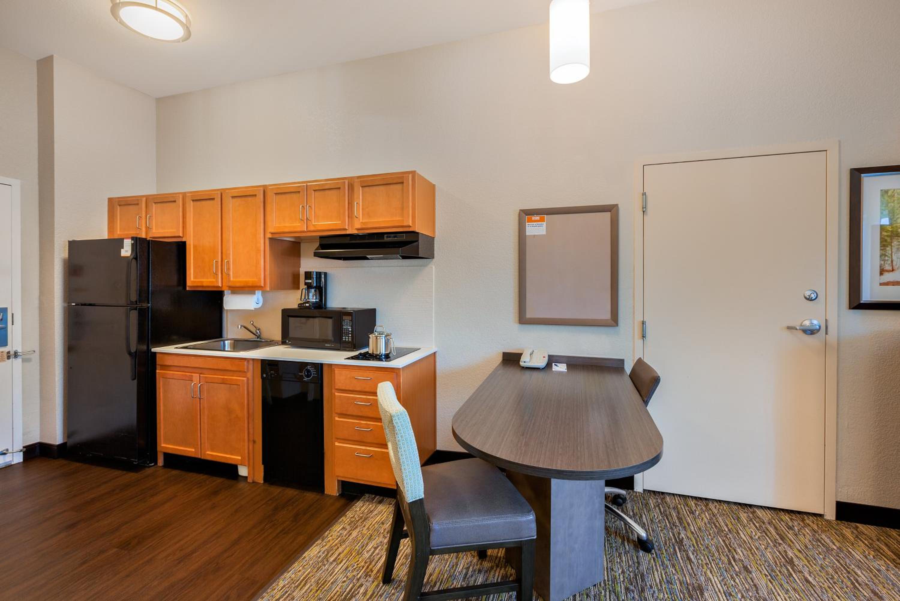 Queen Studio Suite with Roll In Shower - Mobility Accessible