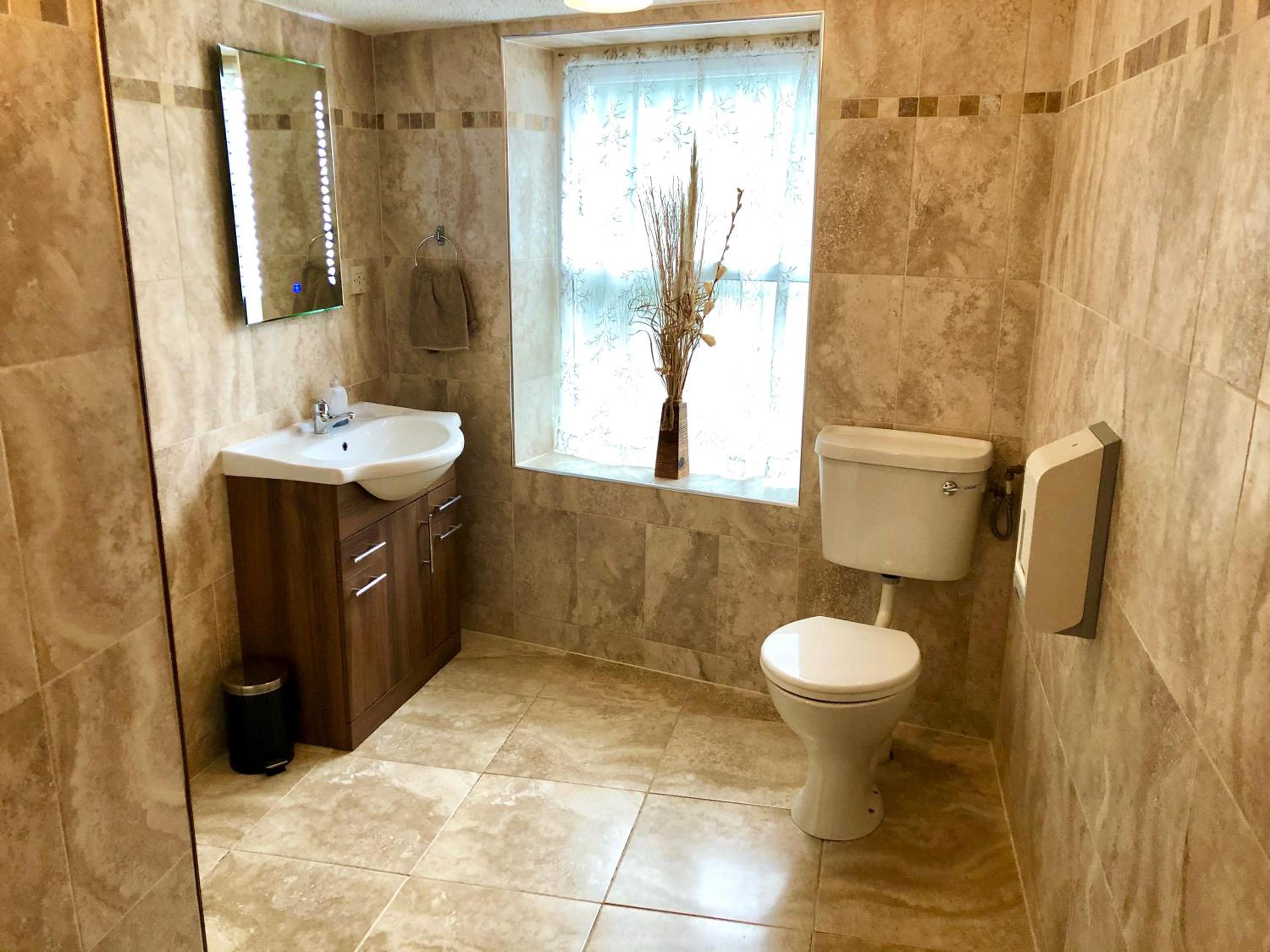 Family Room with Shared Bathroom photo 1
