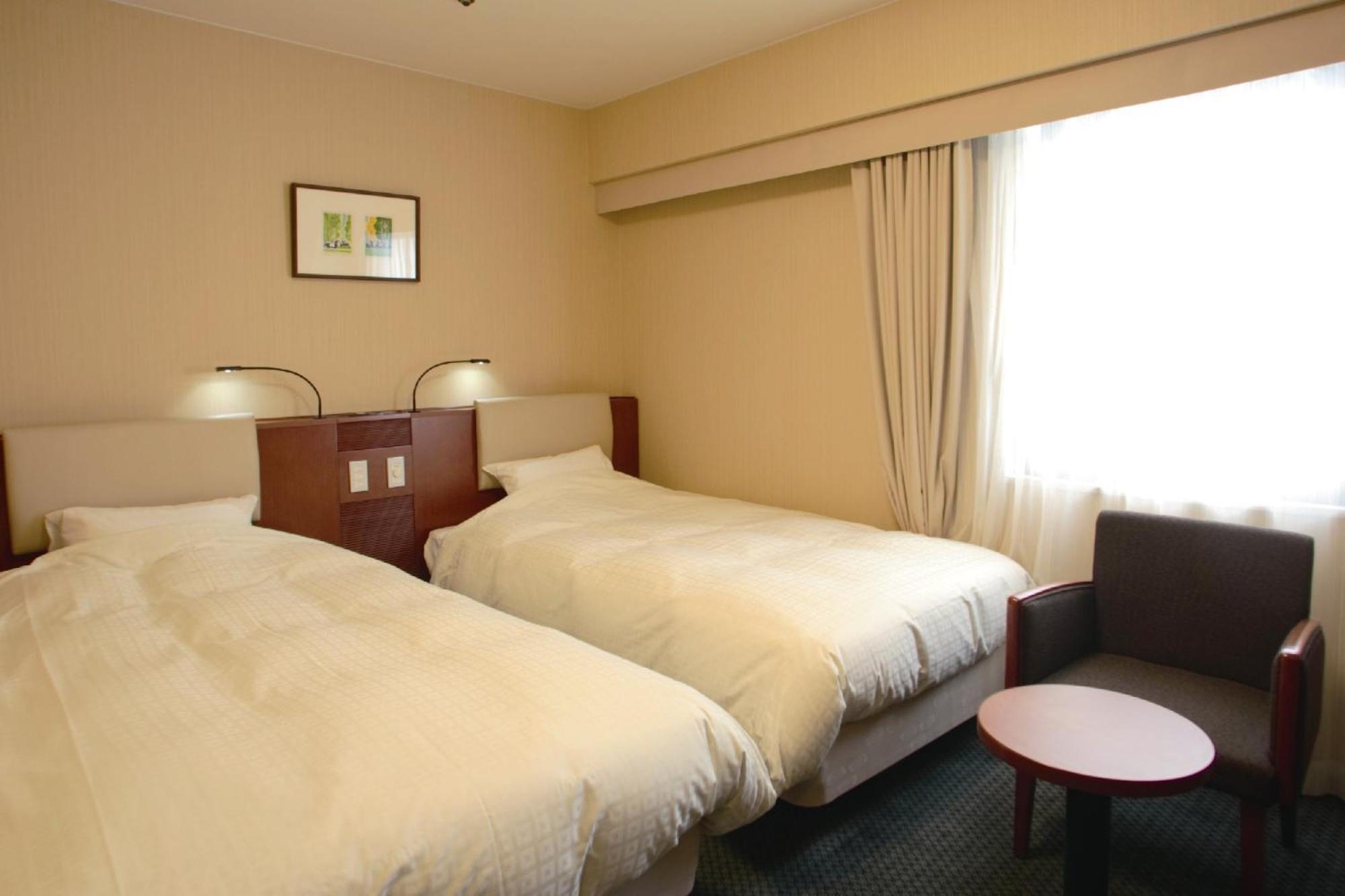 Twin Room - Non-Smoking photo 1
