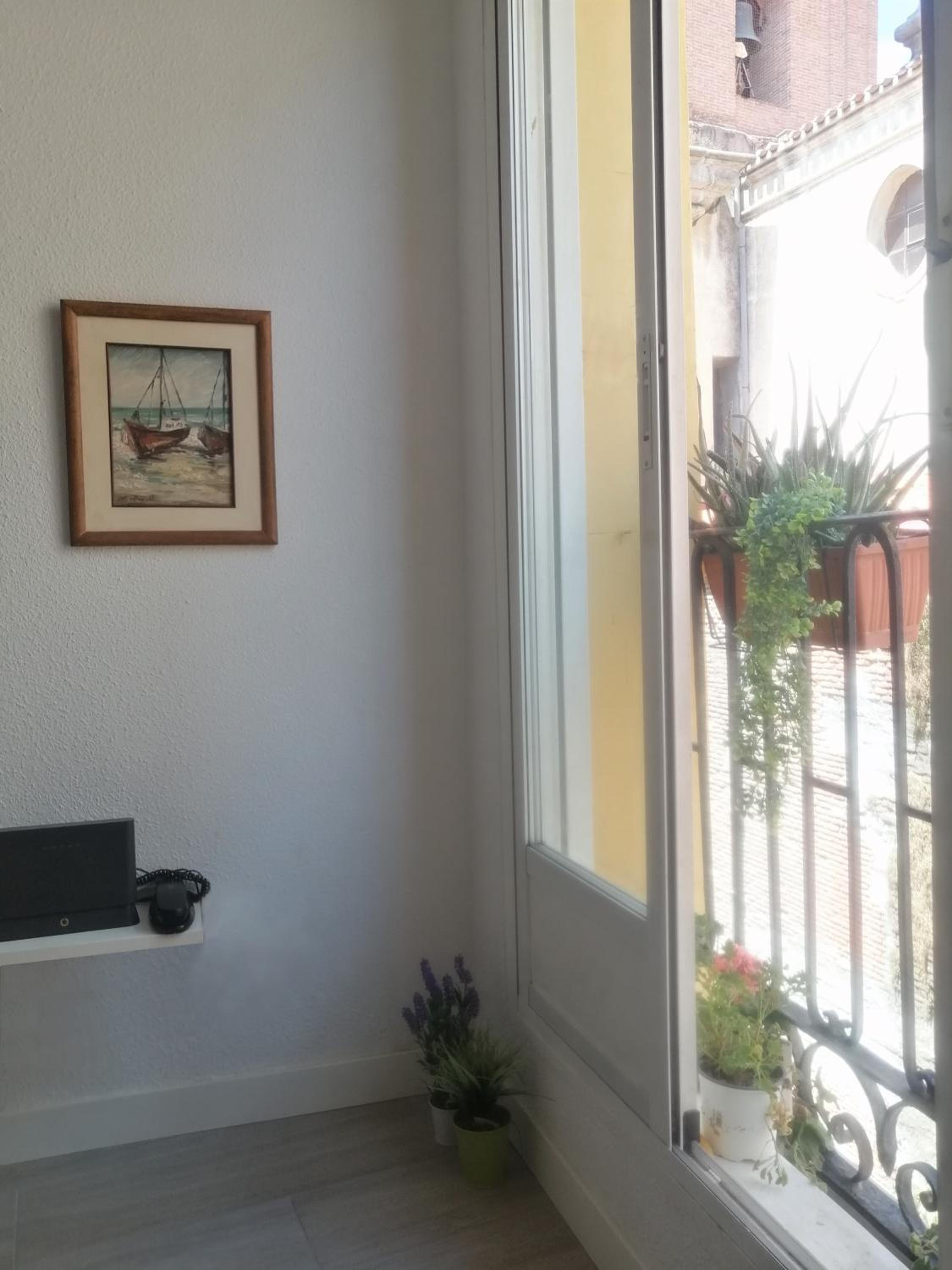 Apartment with Balcony - Photo 2