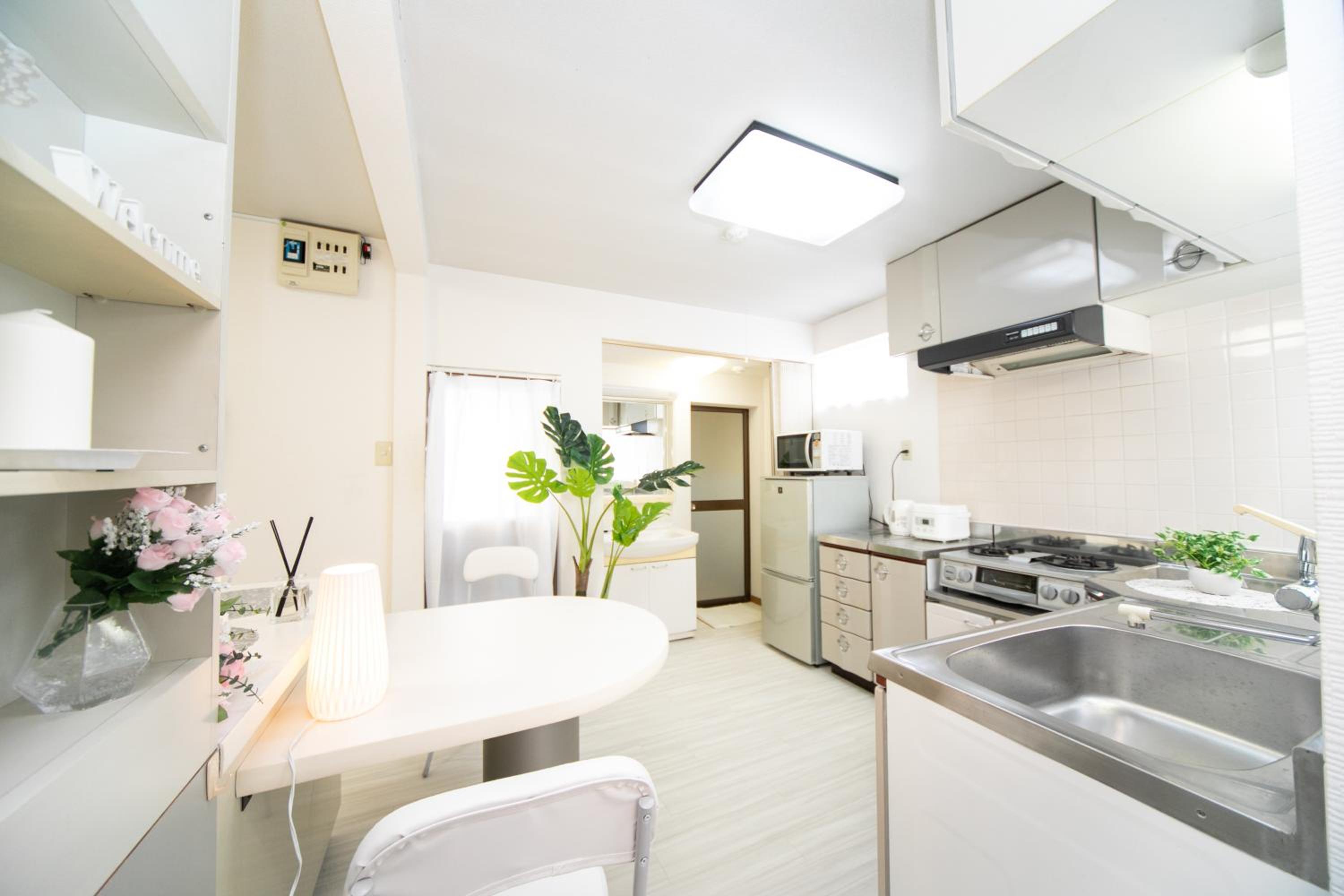 Three-Bedroom House - Photo 19