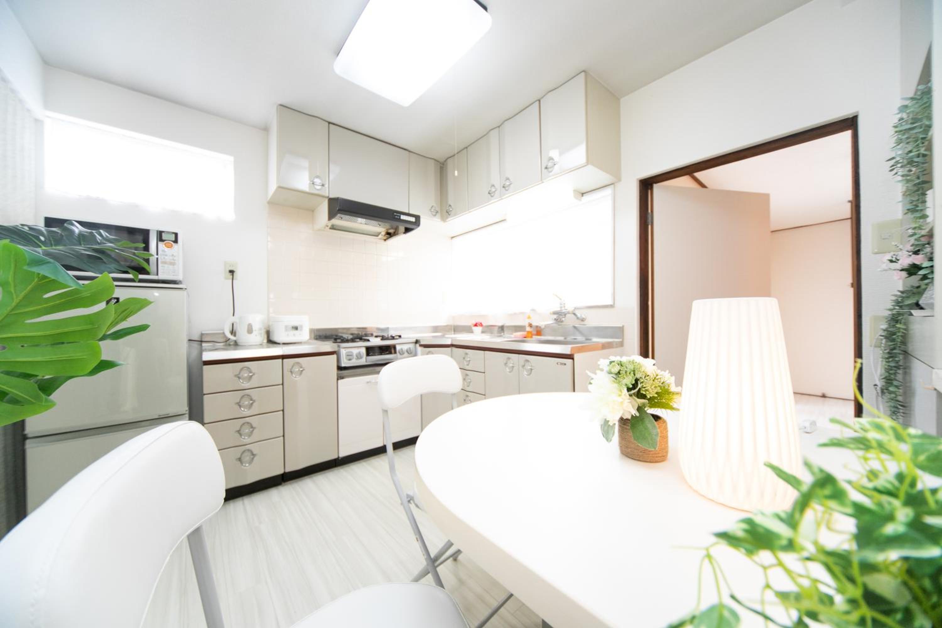 Three-Bedroom House - Photo 18