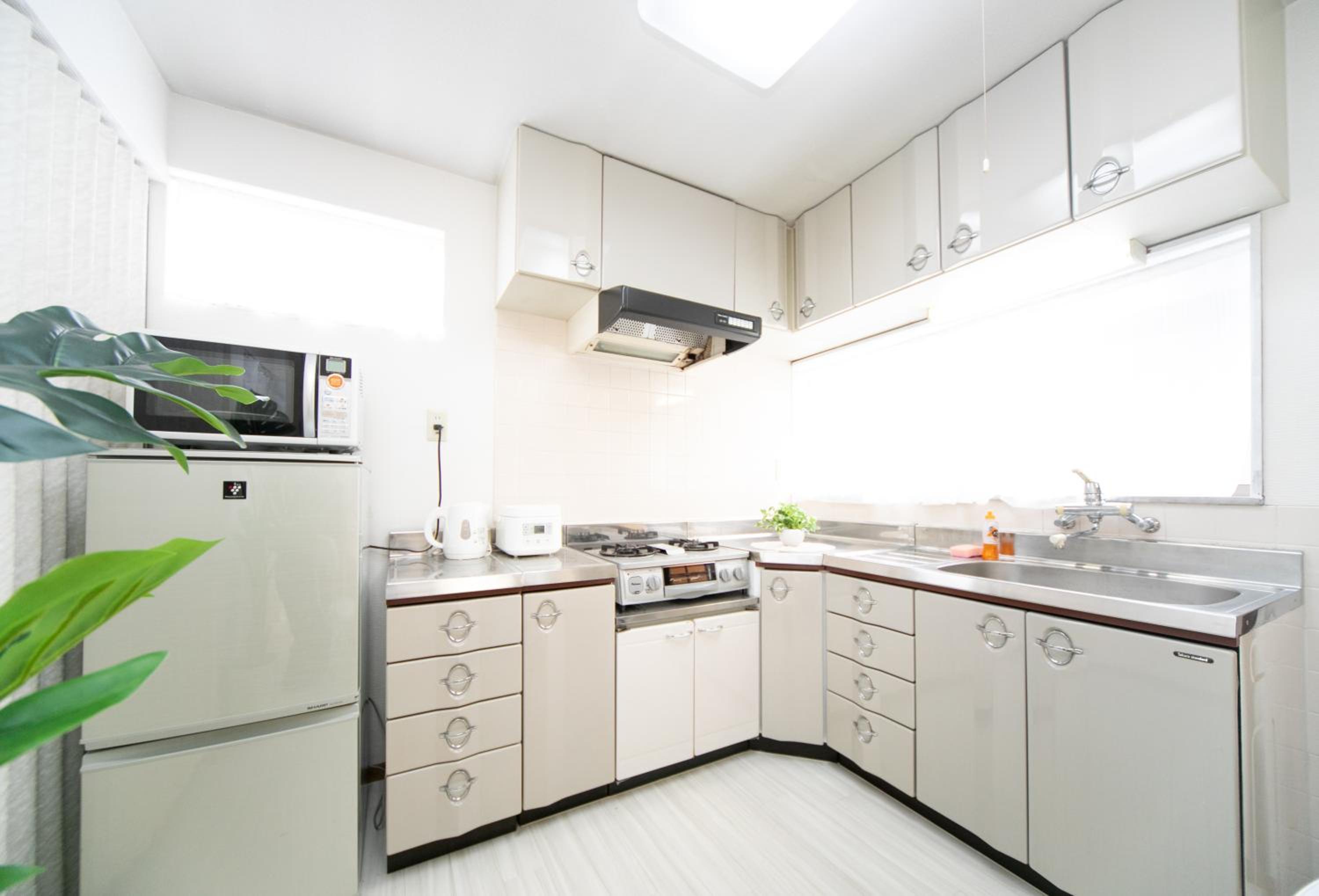 Three-Bedroom House - Photo 7