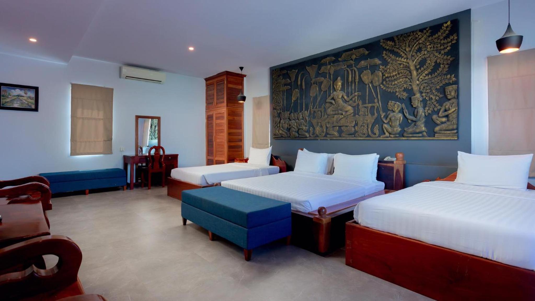 Deluxe Triple Room - Photo 13