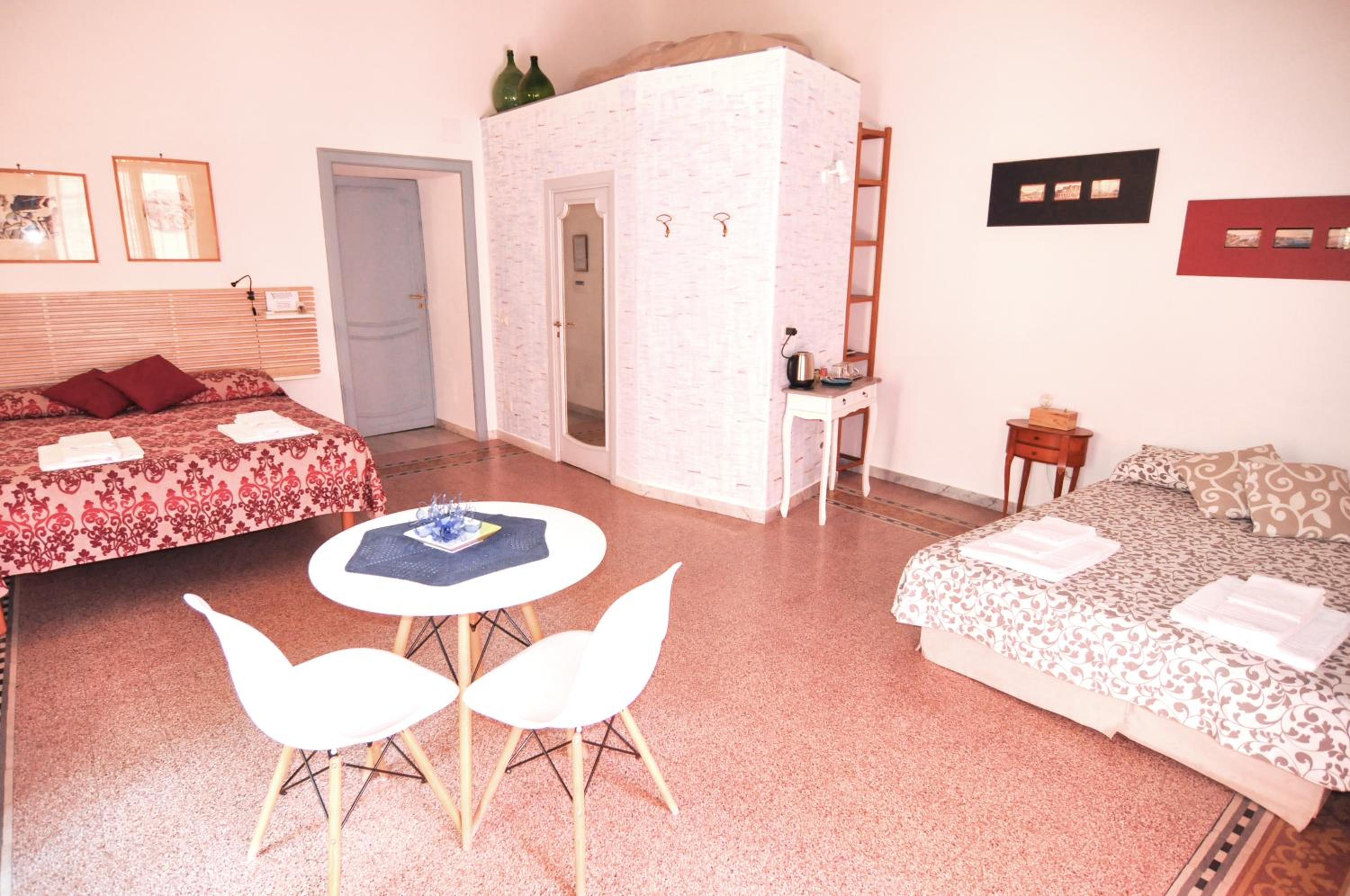Quadruple Room with Private Bathroom