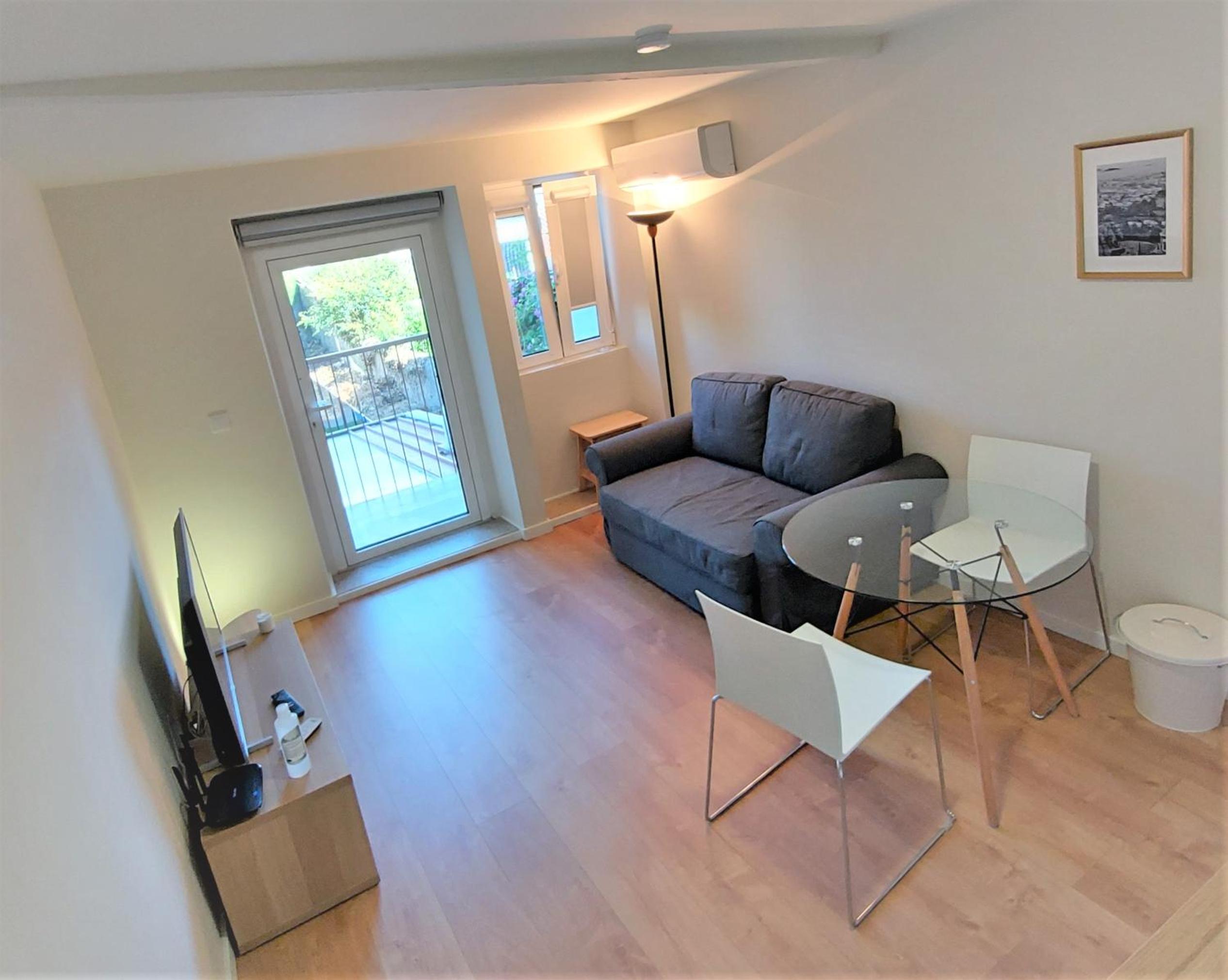 Apartment with Balcony - Photo 8