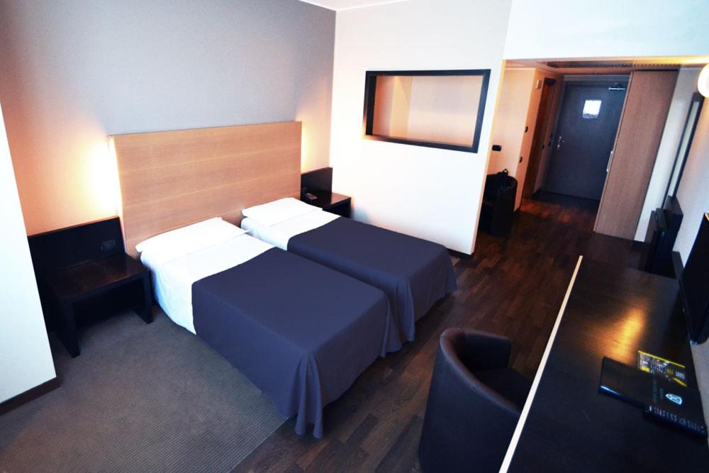 Twin Room - Photo 1