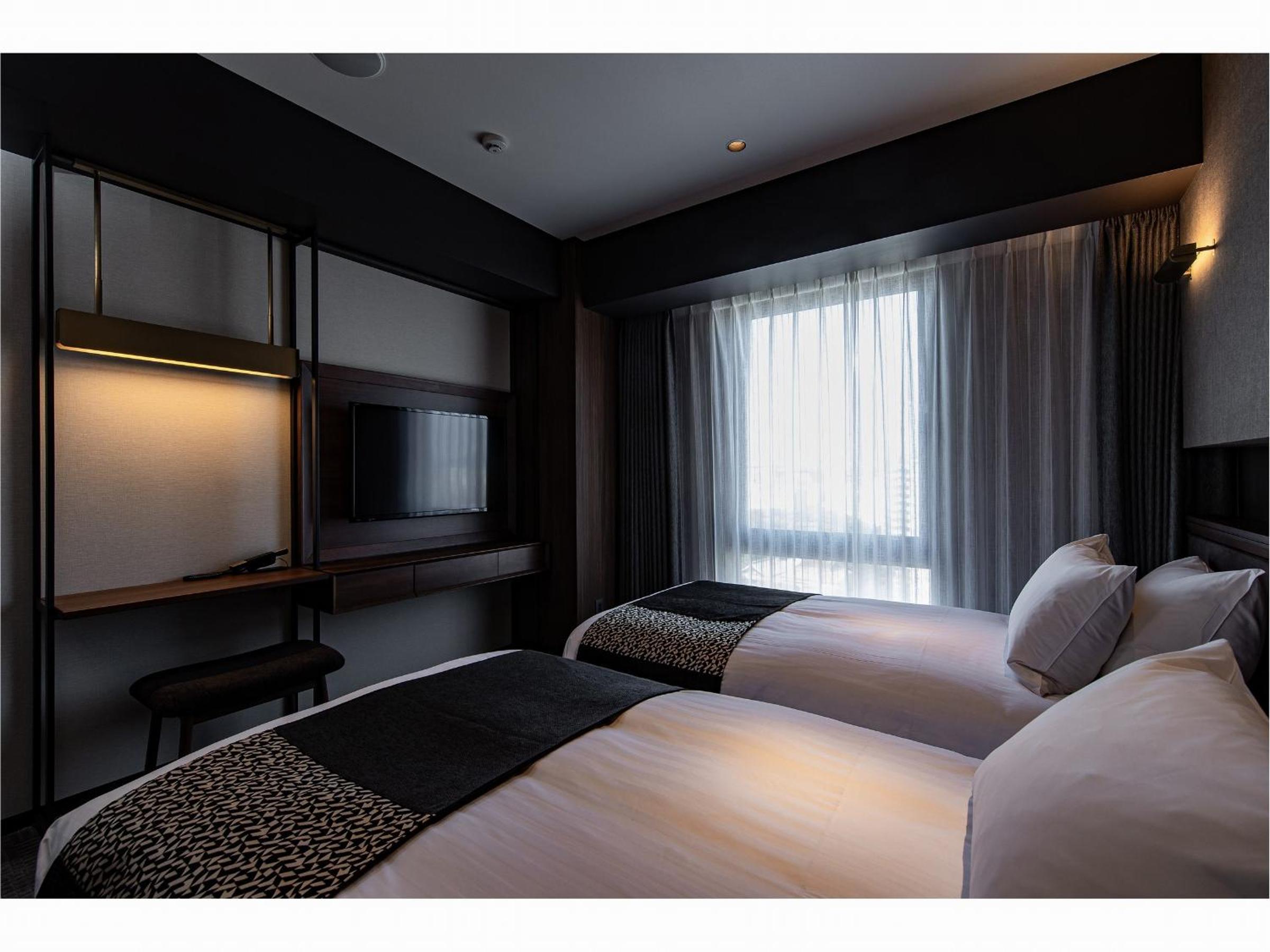 Twin Room - Photo 7
