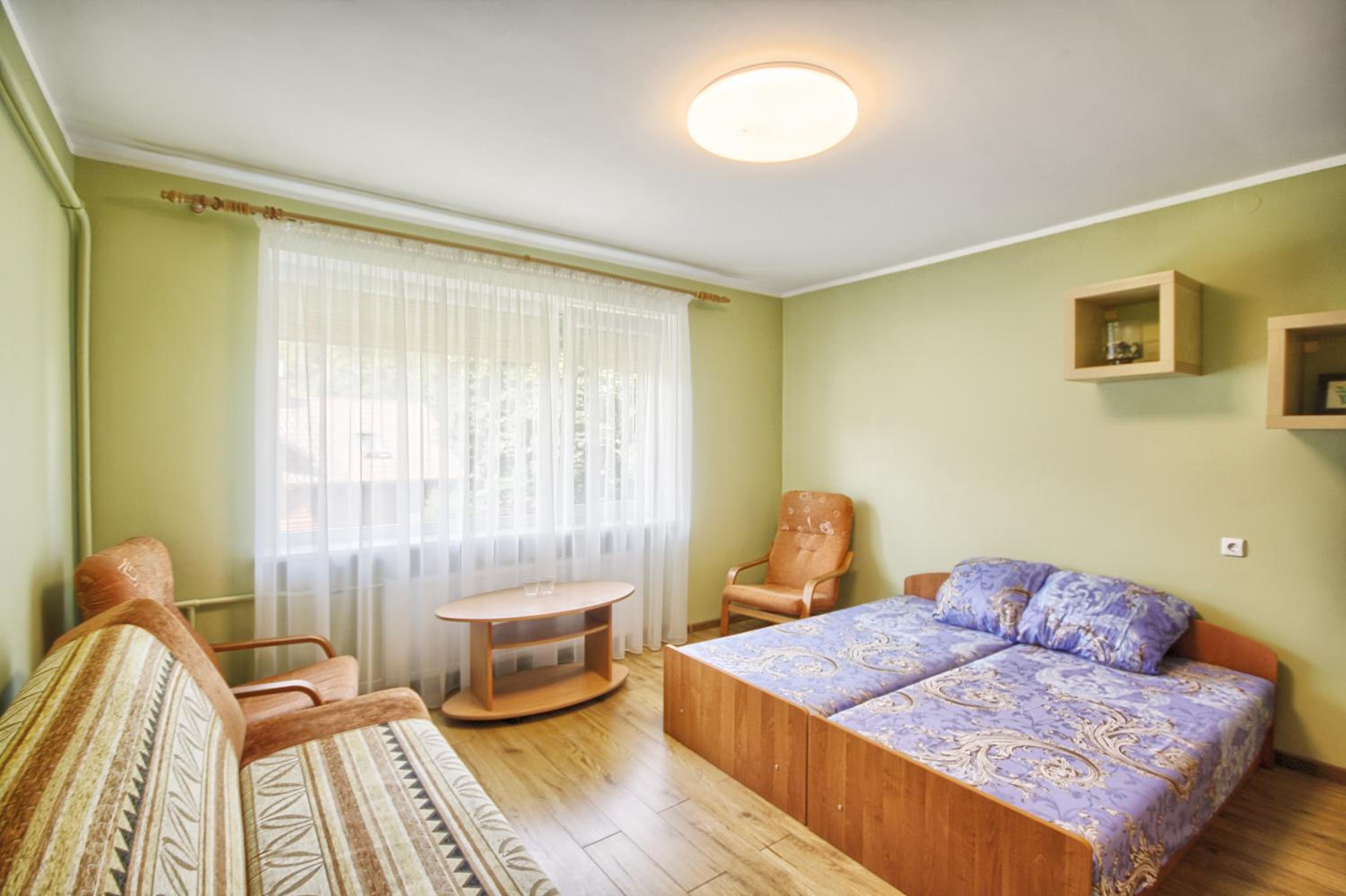 Three-Bedroom Apartment - Photo 6