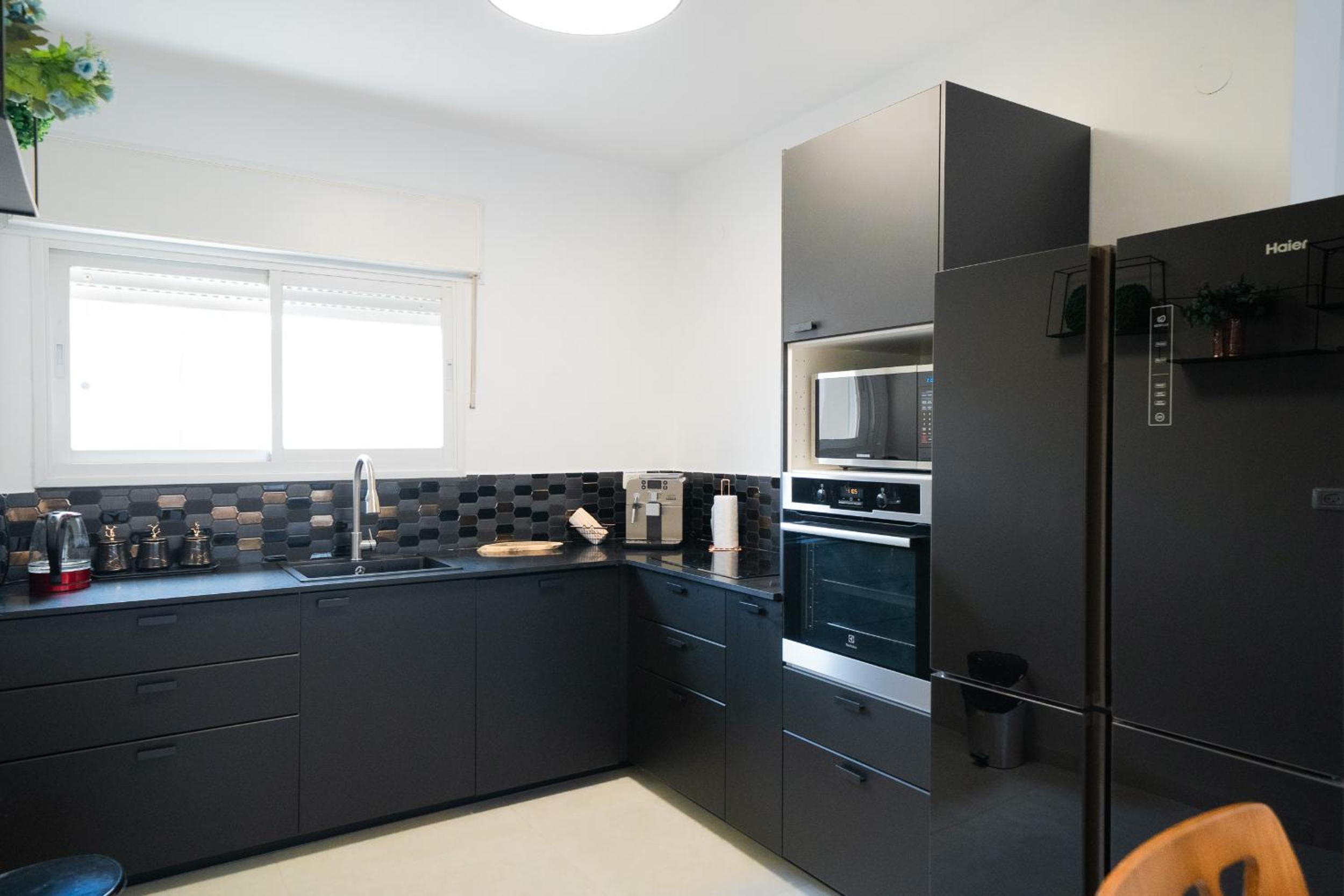 Three-Bedroom Apartment - Photo 24
