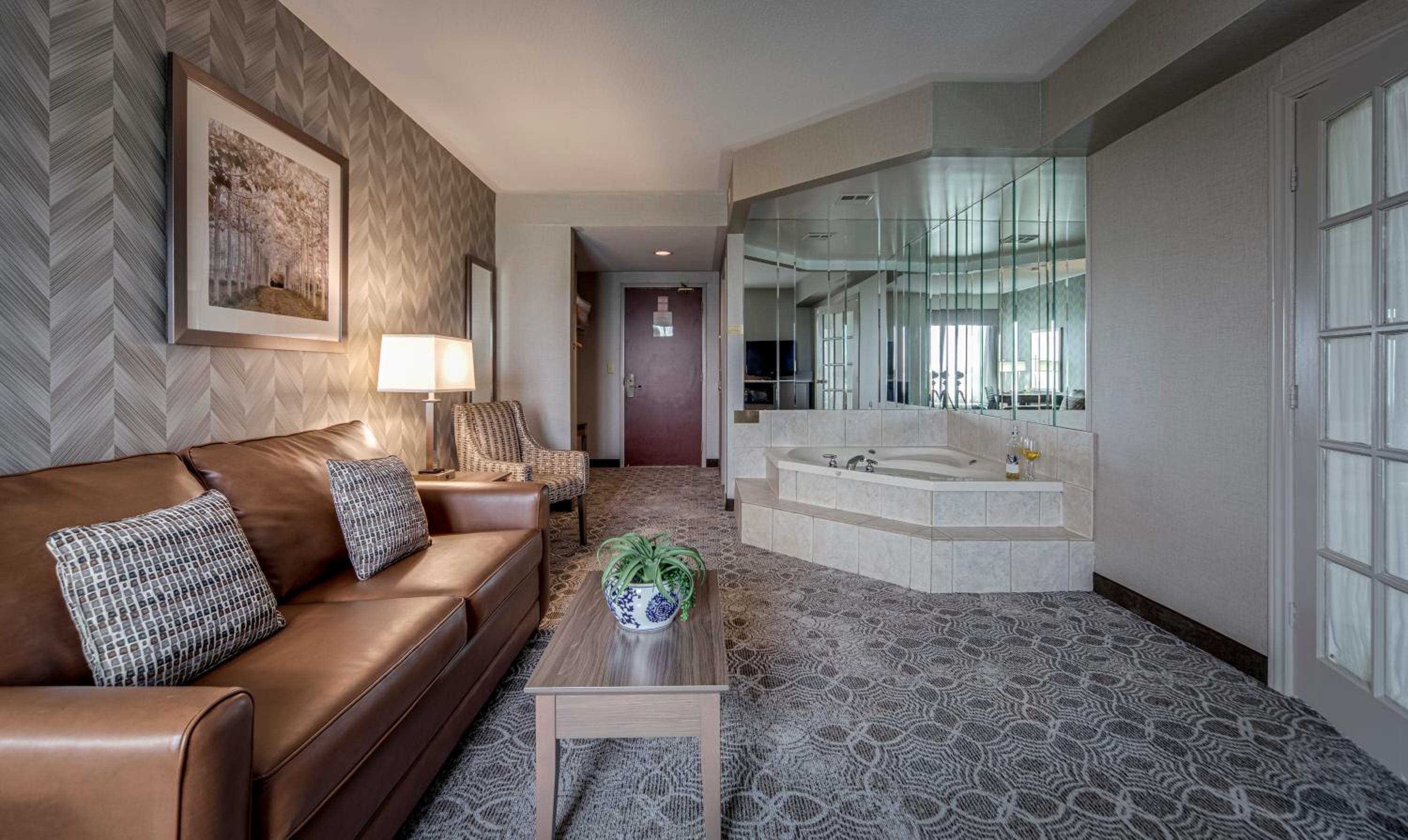 Deluxe King Suite with Jetted Tub and Living Room - Photo 6