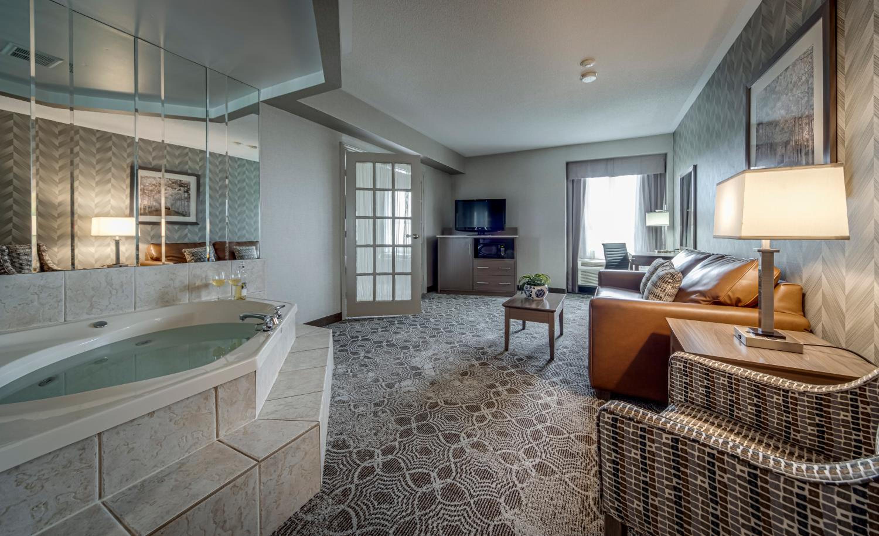 Deluxe King Suite with Jetted Tub and Living Room - Photo 7