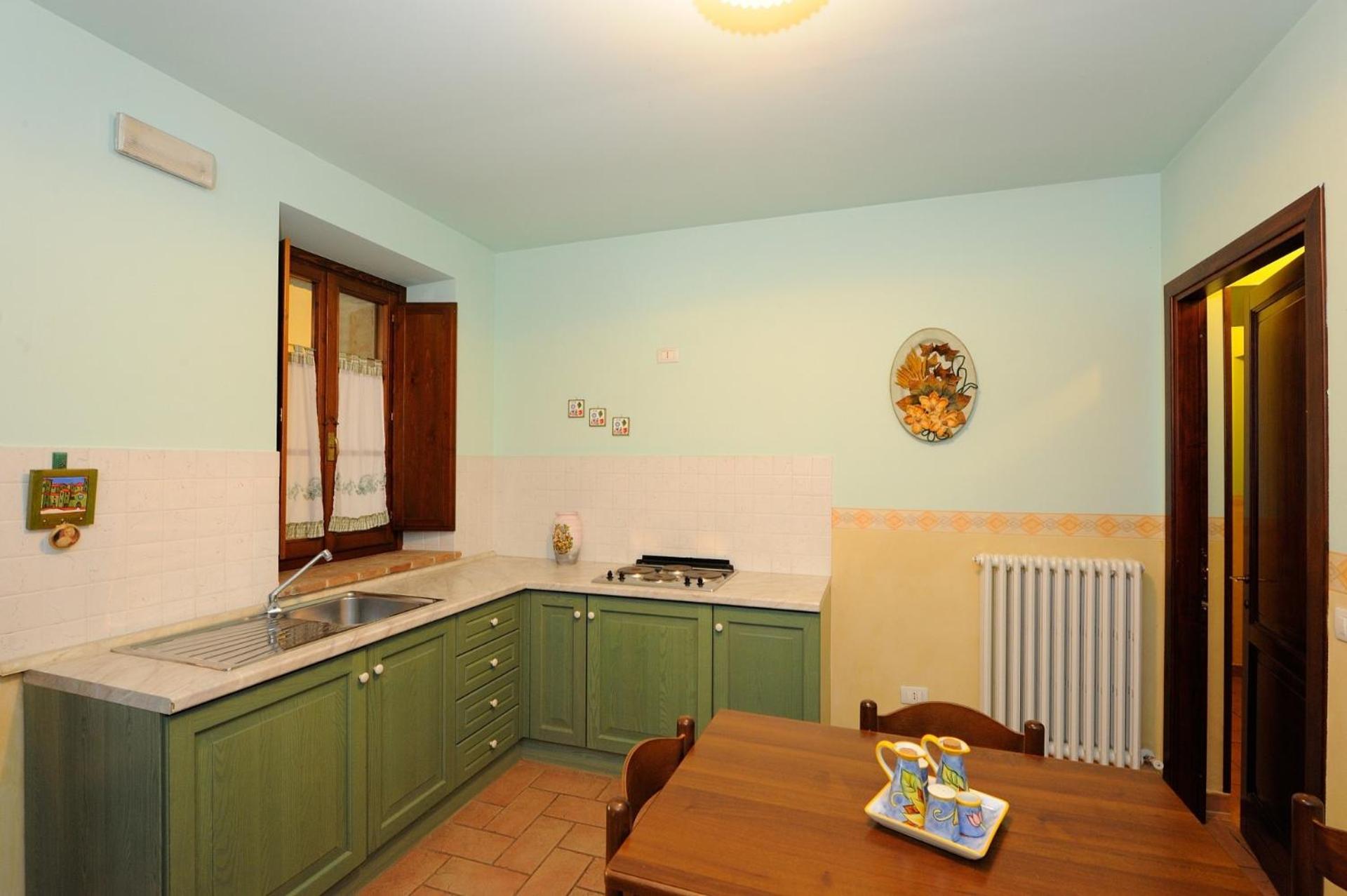 Two-Bedroom Apartment - Photo 19