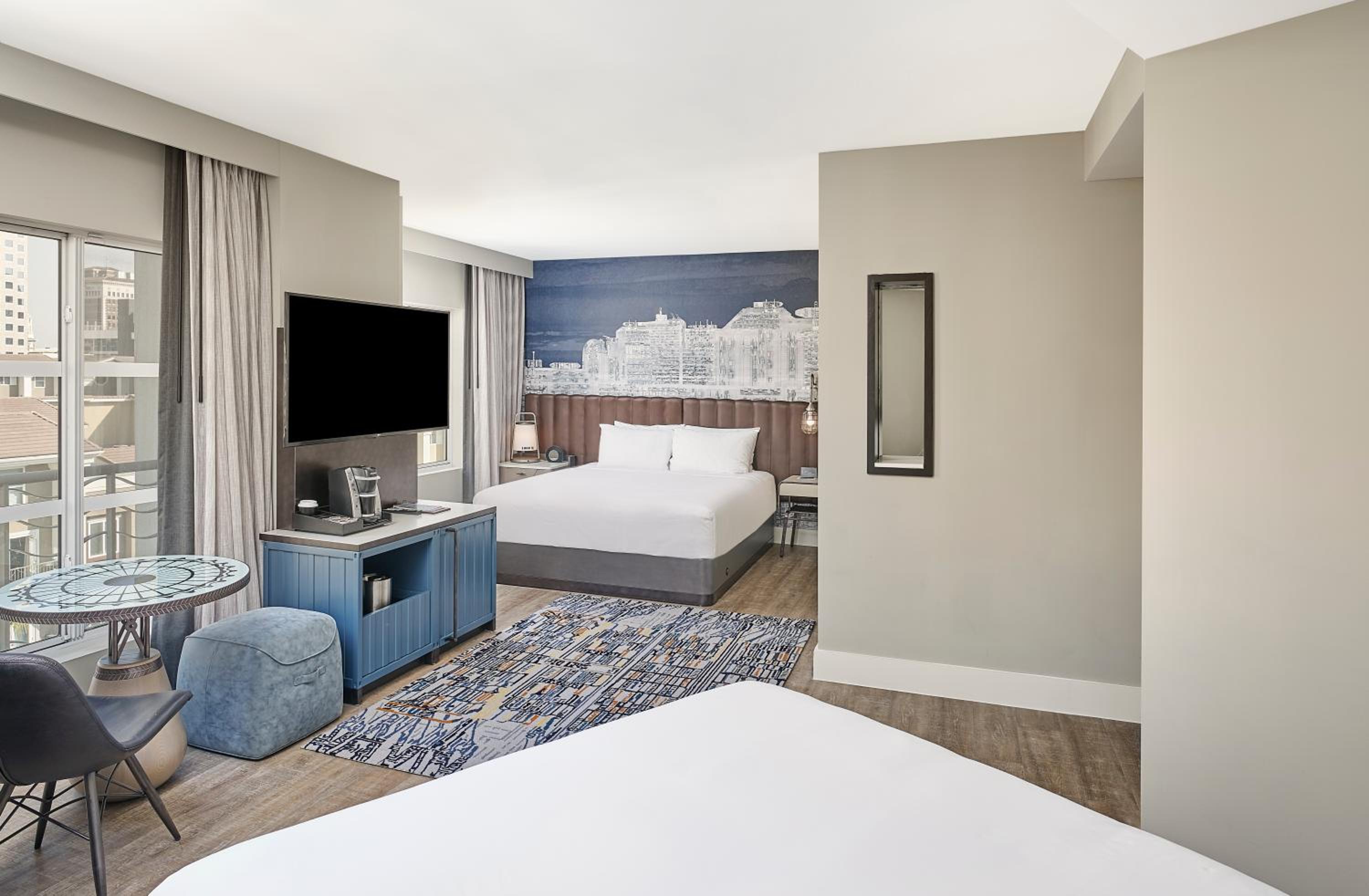 Deluxe Room with One King and One Queen Bed - Photo 4