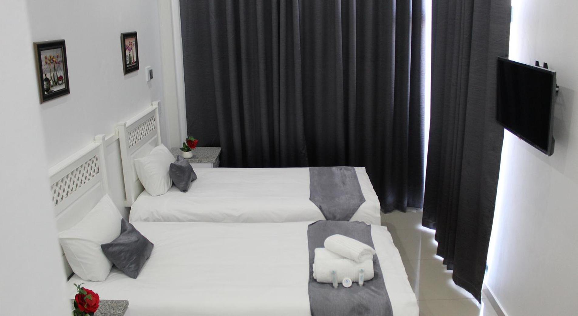 Family Suite with Balcony - Photo 1