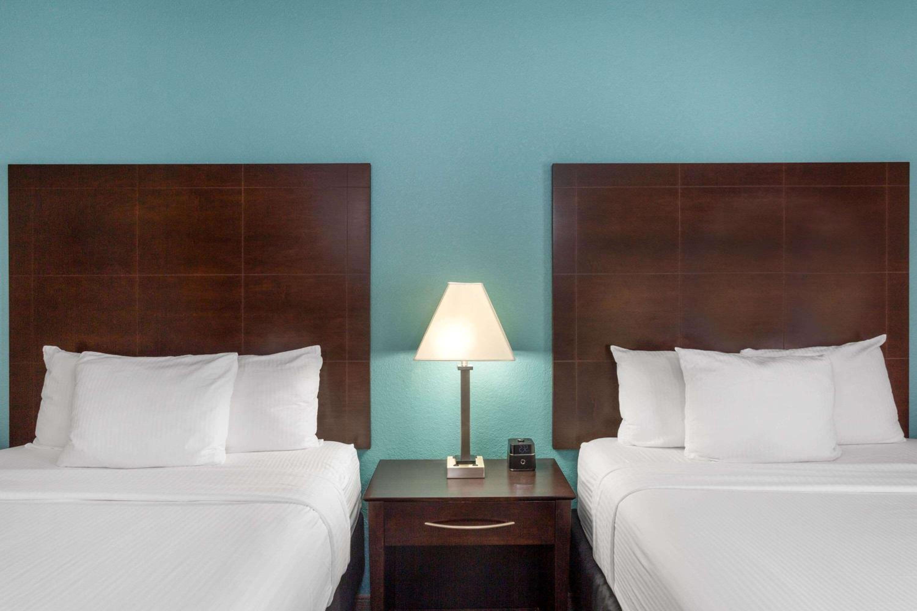 Deluxe Queen Room with Two Queen Beds - Non-Smoking photo 1