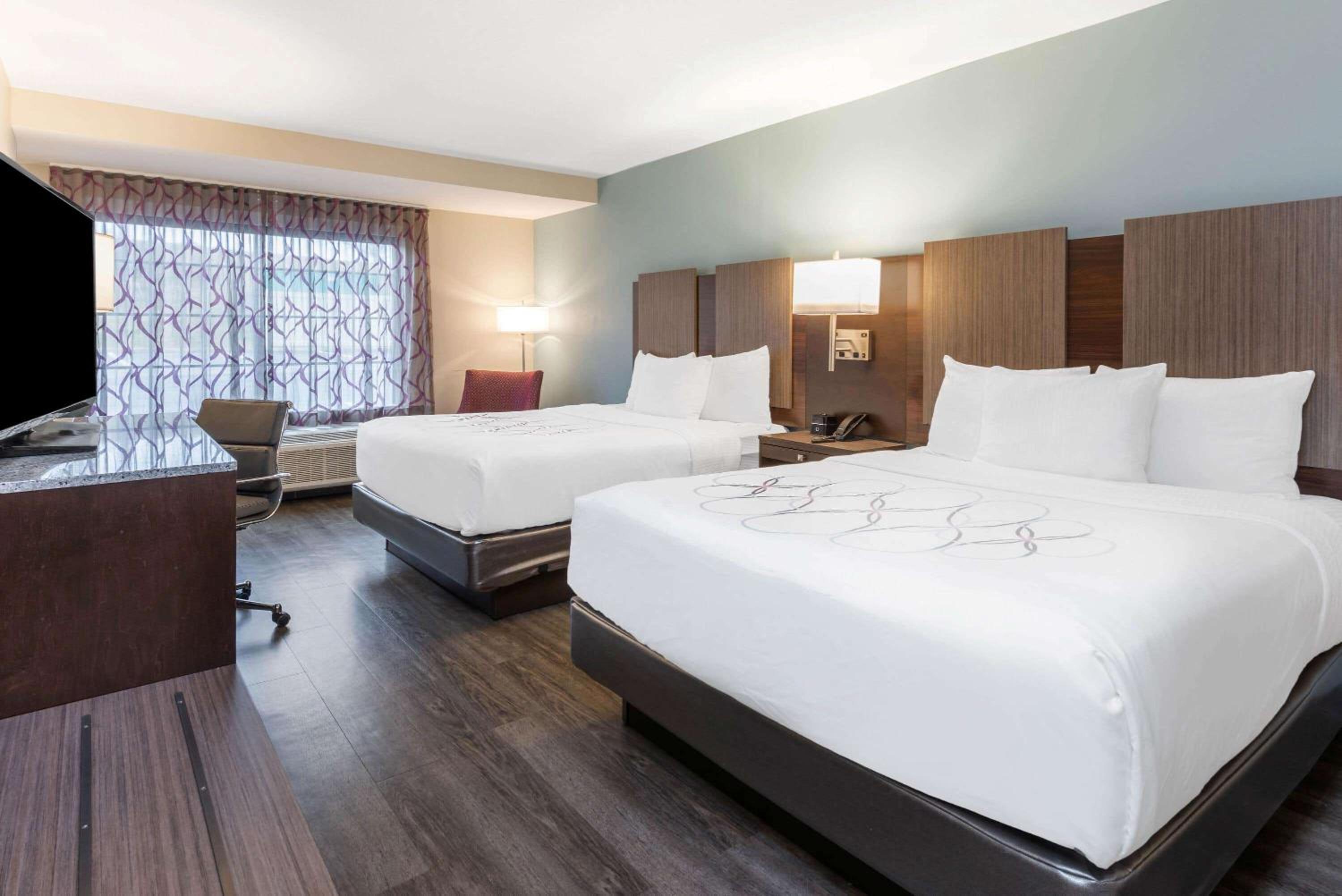 Queen Room with Two Queen Beds - Photo 1