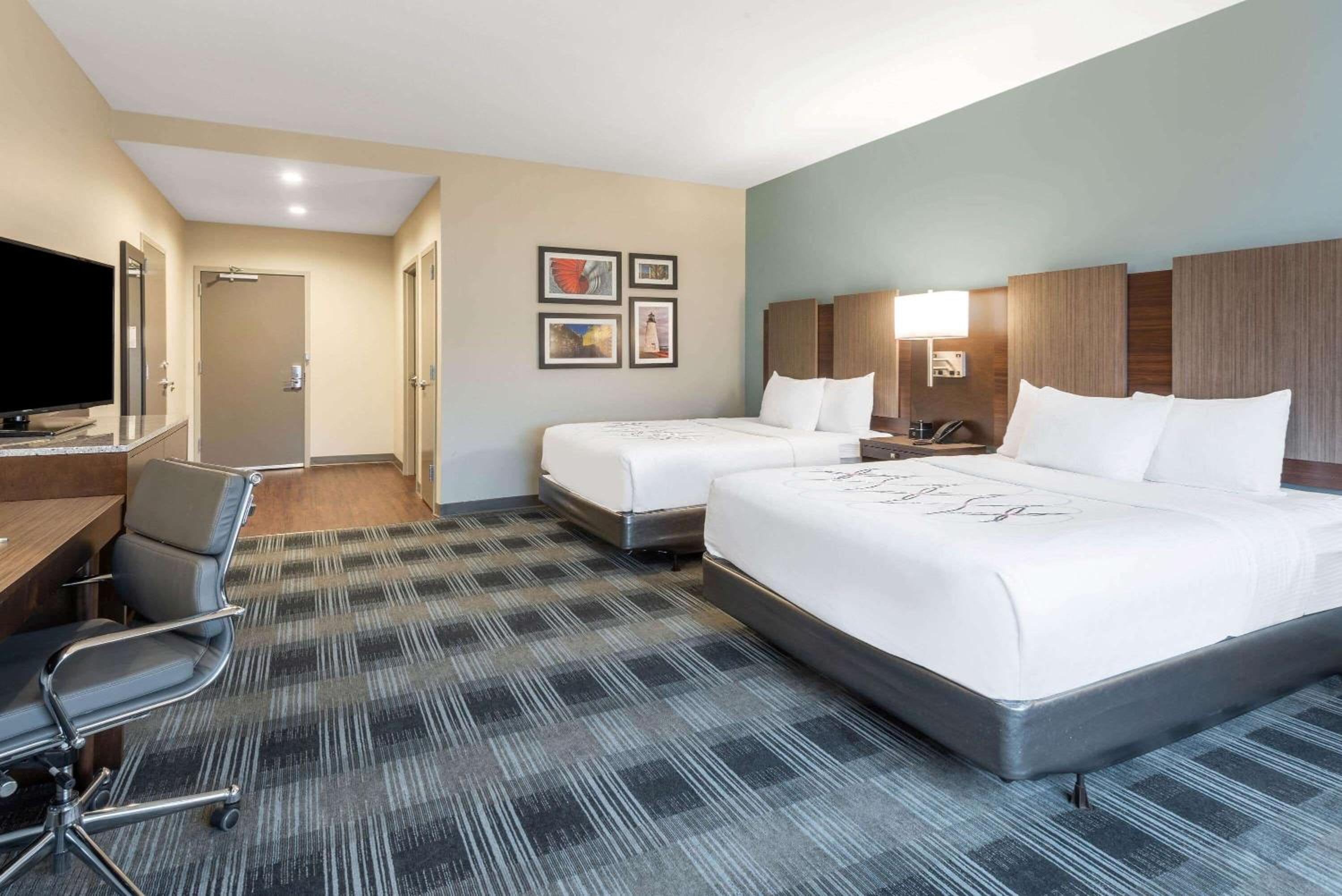 Queen Room with Two Queen Beds and Bath Tub - Mobility Accessible/Non-Smoking - Photo 1