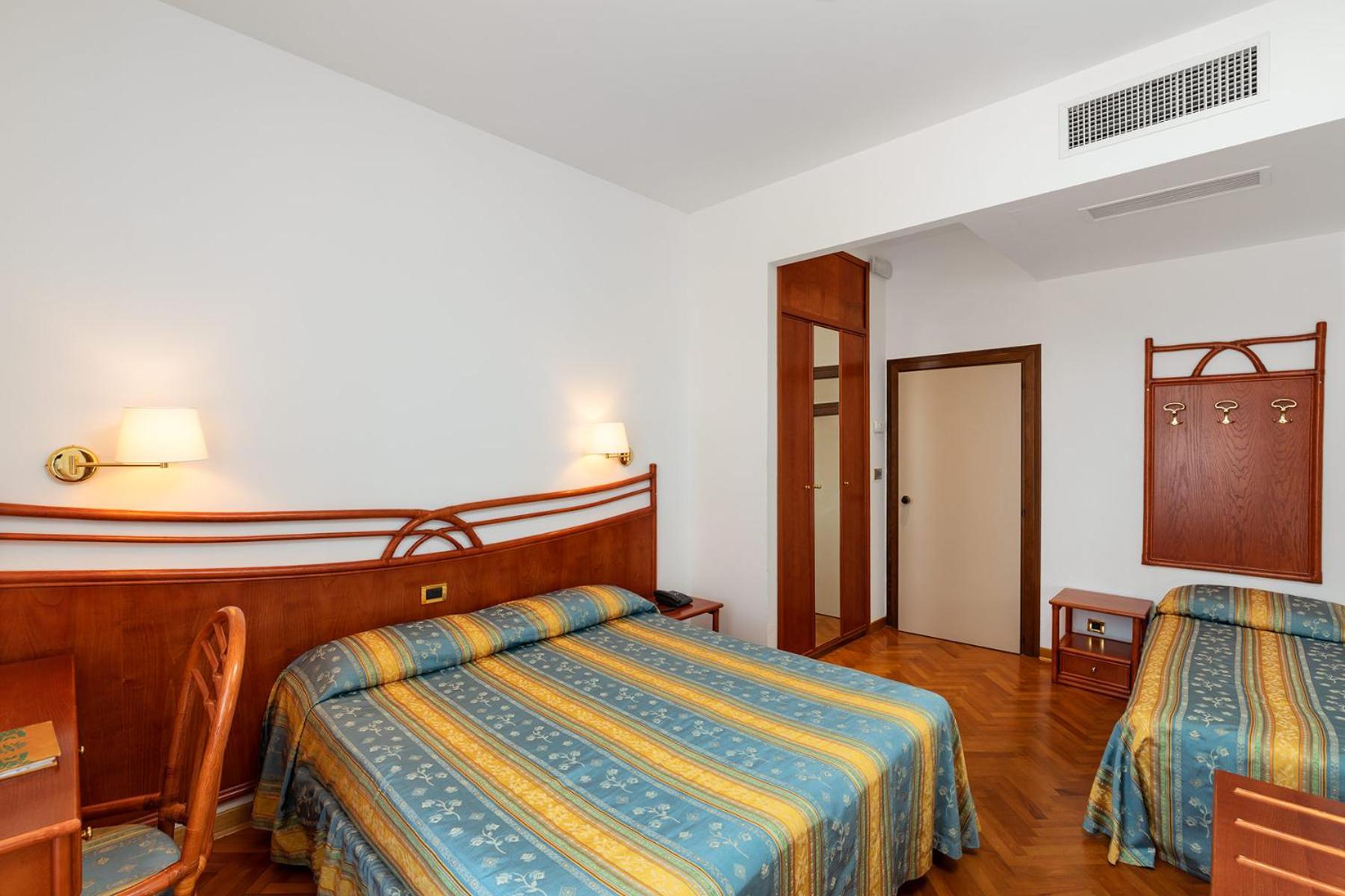 Triple Room - Photo 1