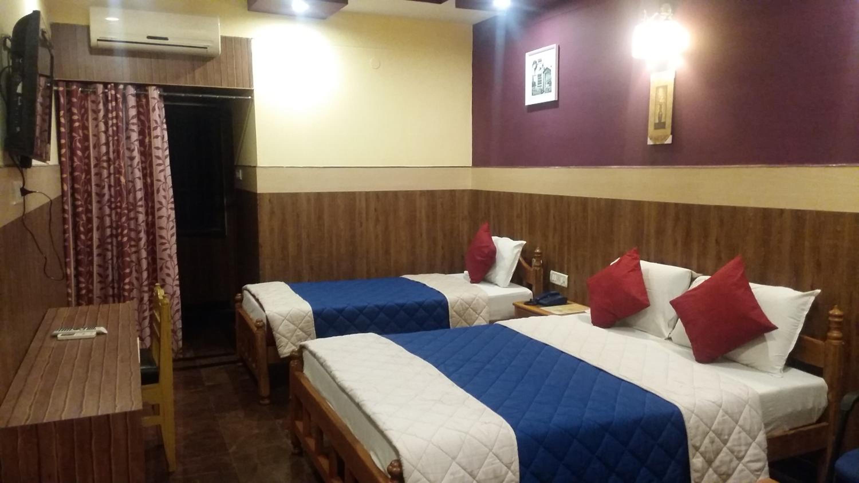 Deluxe Triple Room - Photo 1