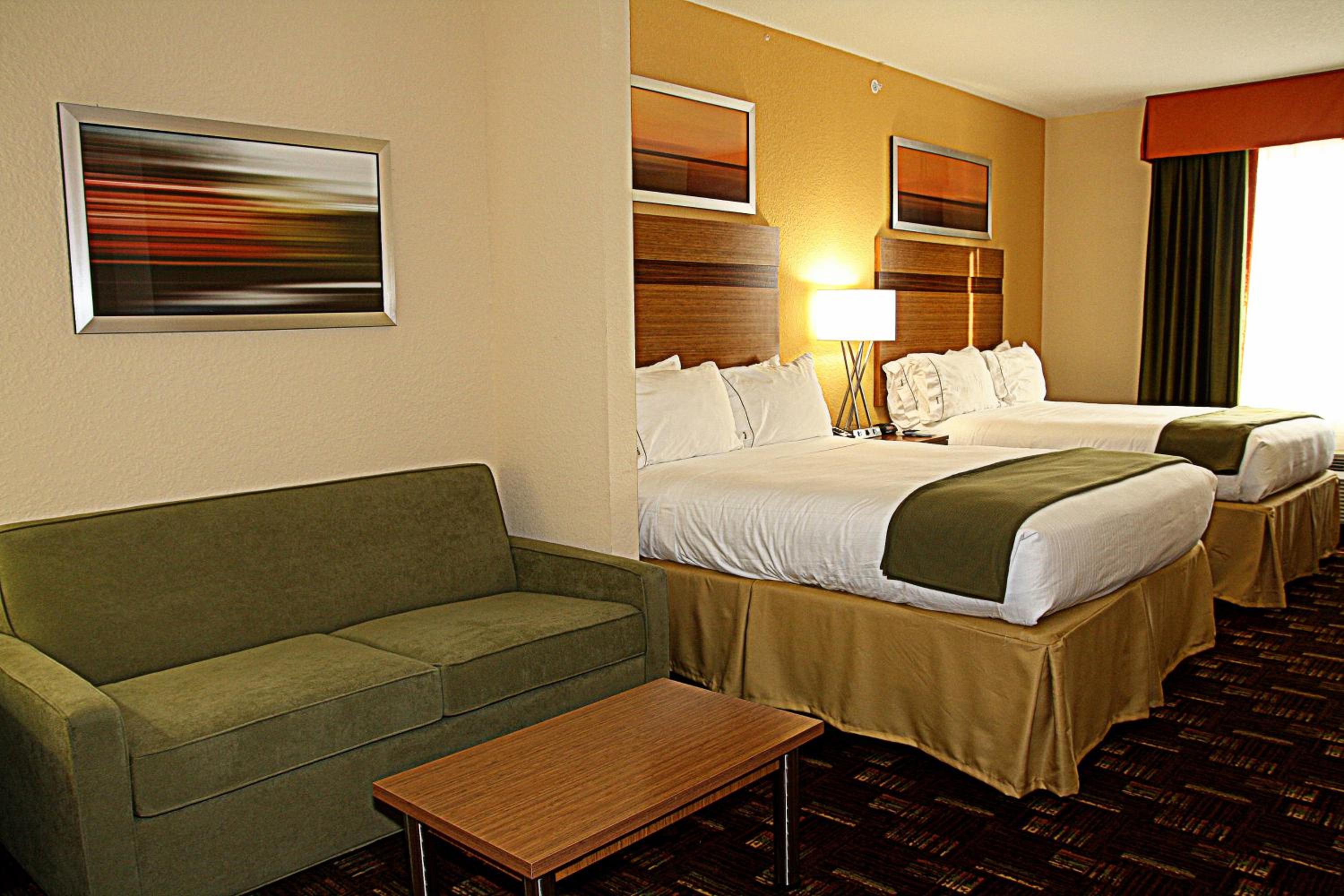 Queen Suite with Two Queen Beds and Sofa Bed - Photo 1