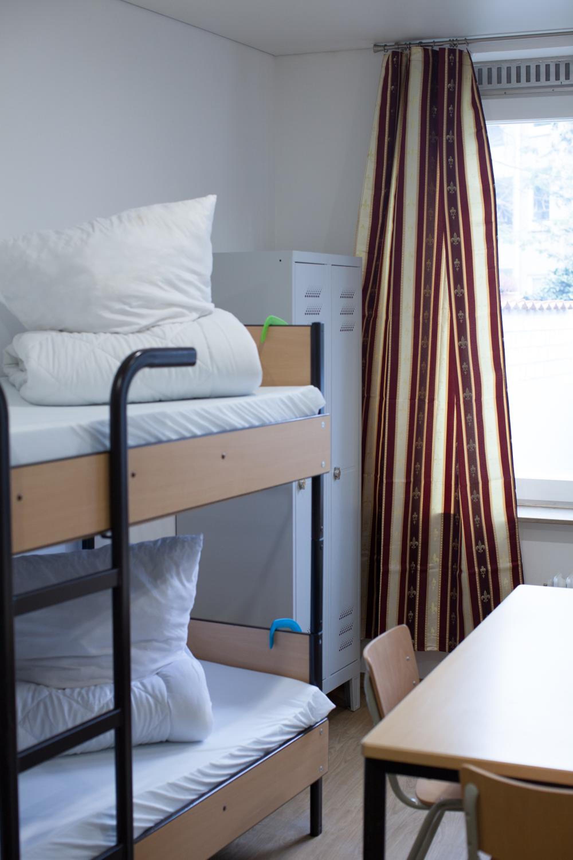 Economy Quadruple Room - Photo 15
