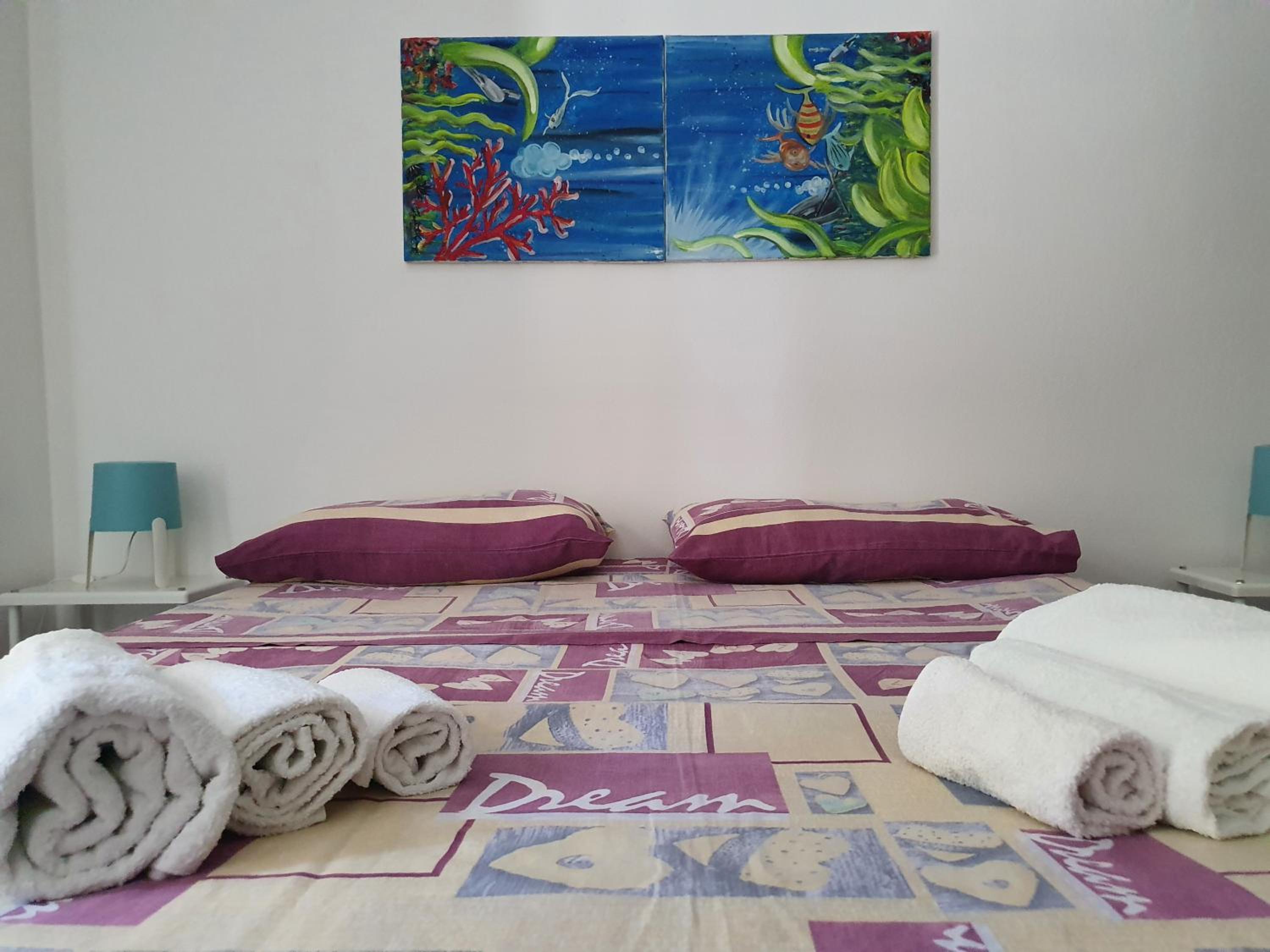 Quadruple Room with Balcony - Photo 1
