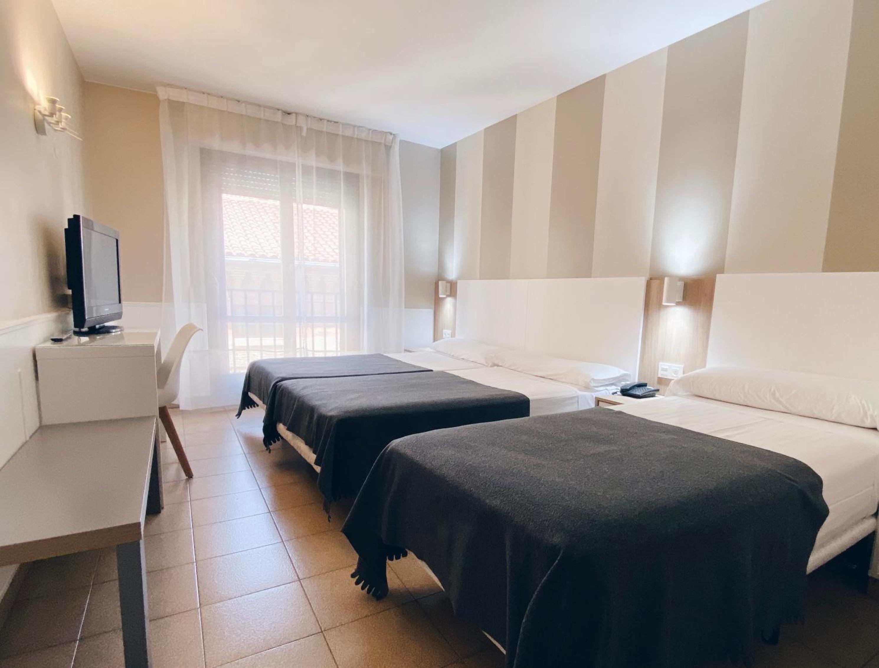 Triple Room - Photo 1